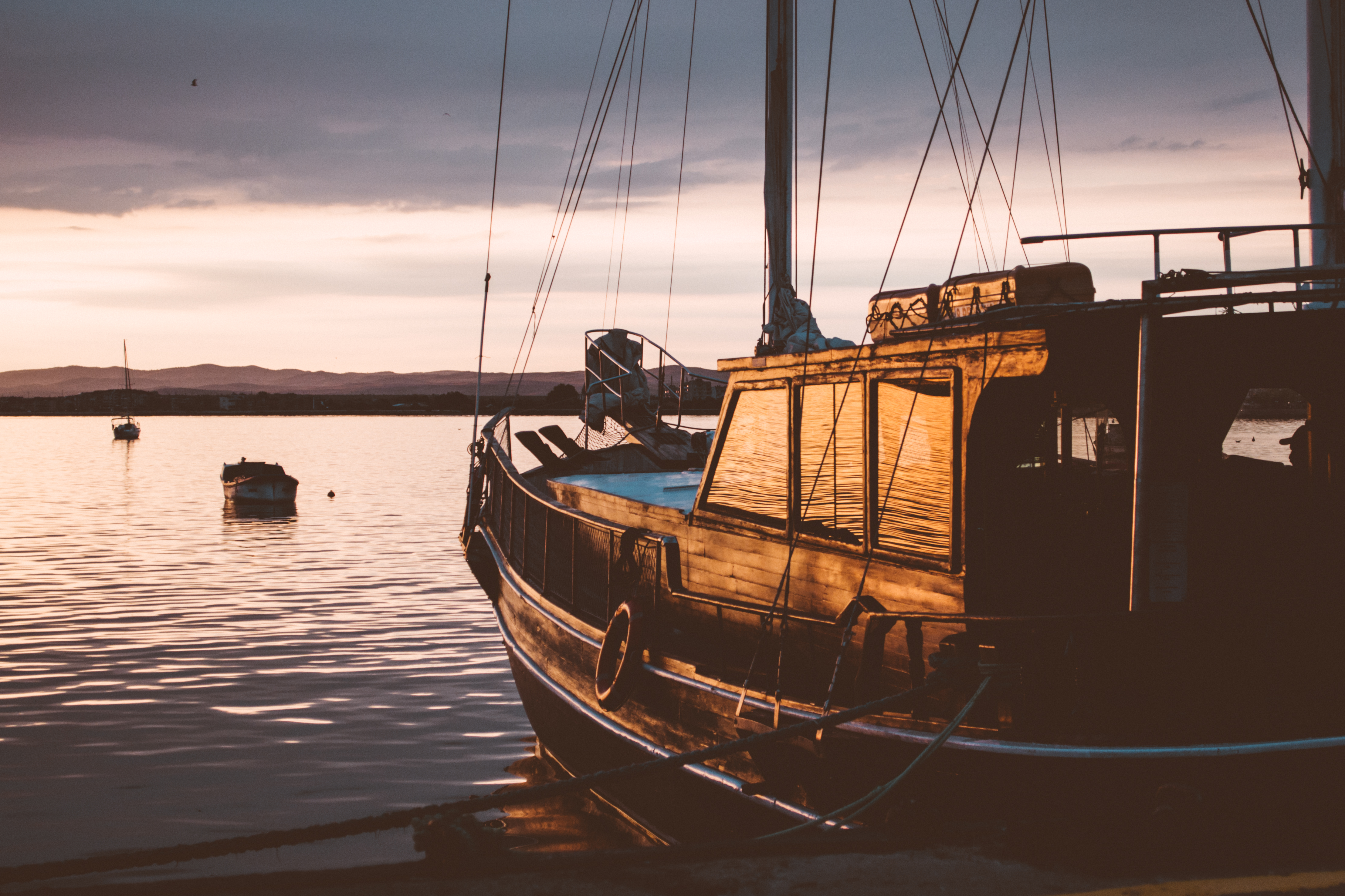 Download mobile wallpaper Sea, Nature, Sunset, Sailing Boat, Sailboat for free.