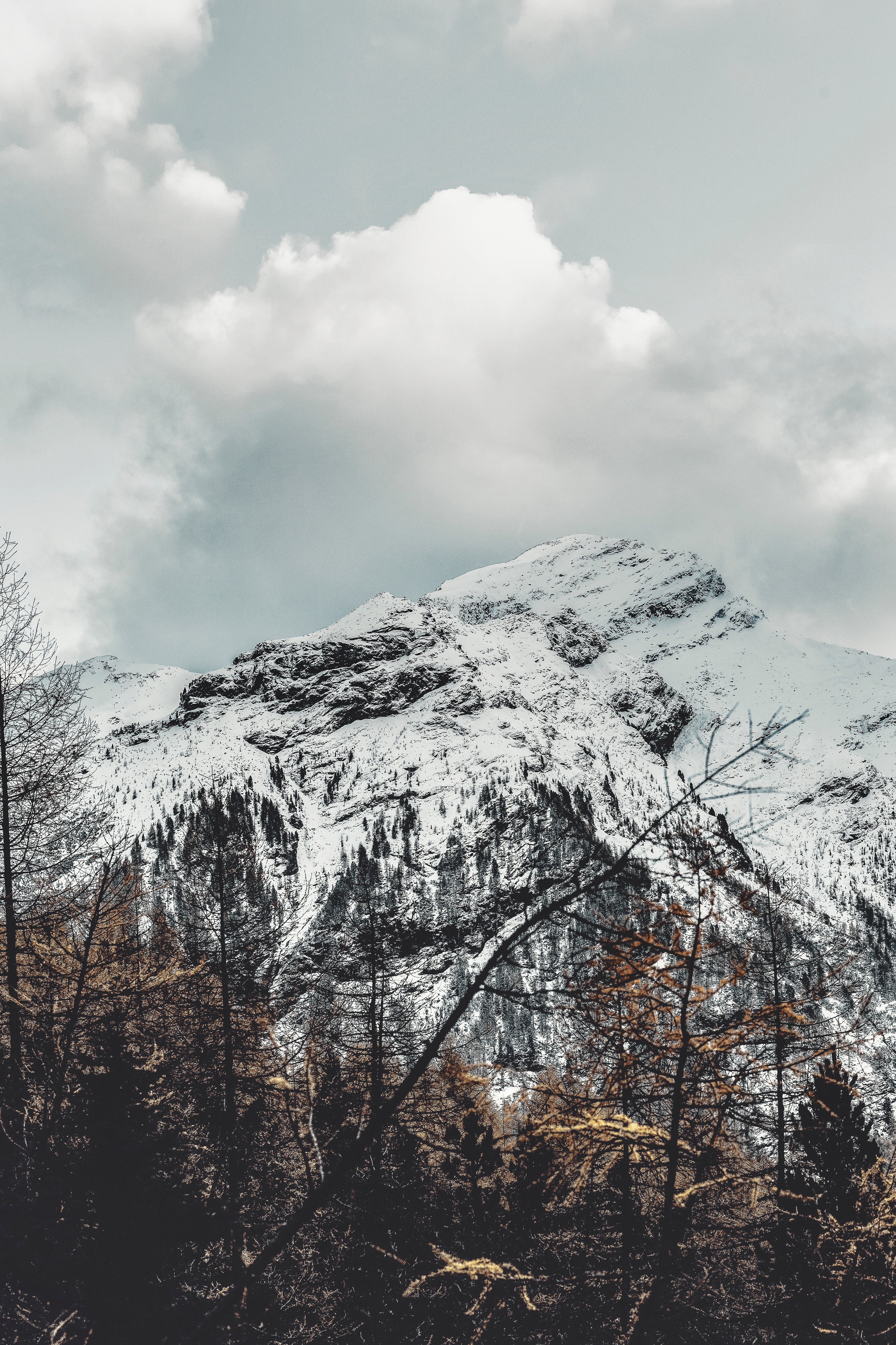 Download mobile wallpaper Top, Clouds, Vertex, Nature, Mountain, Snow, Landscape for free.