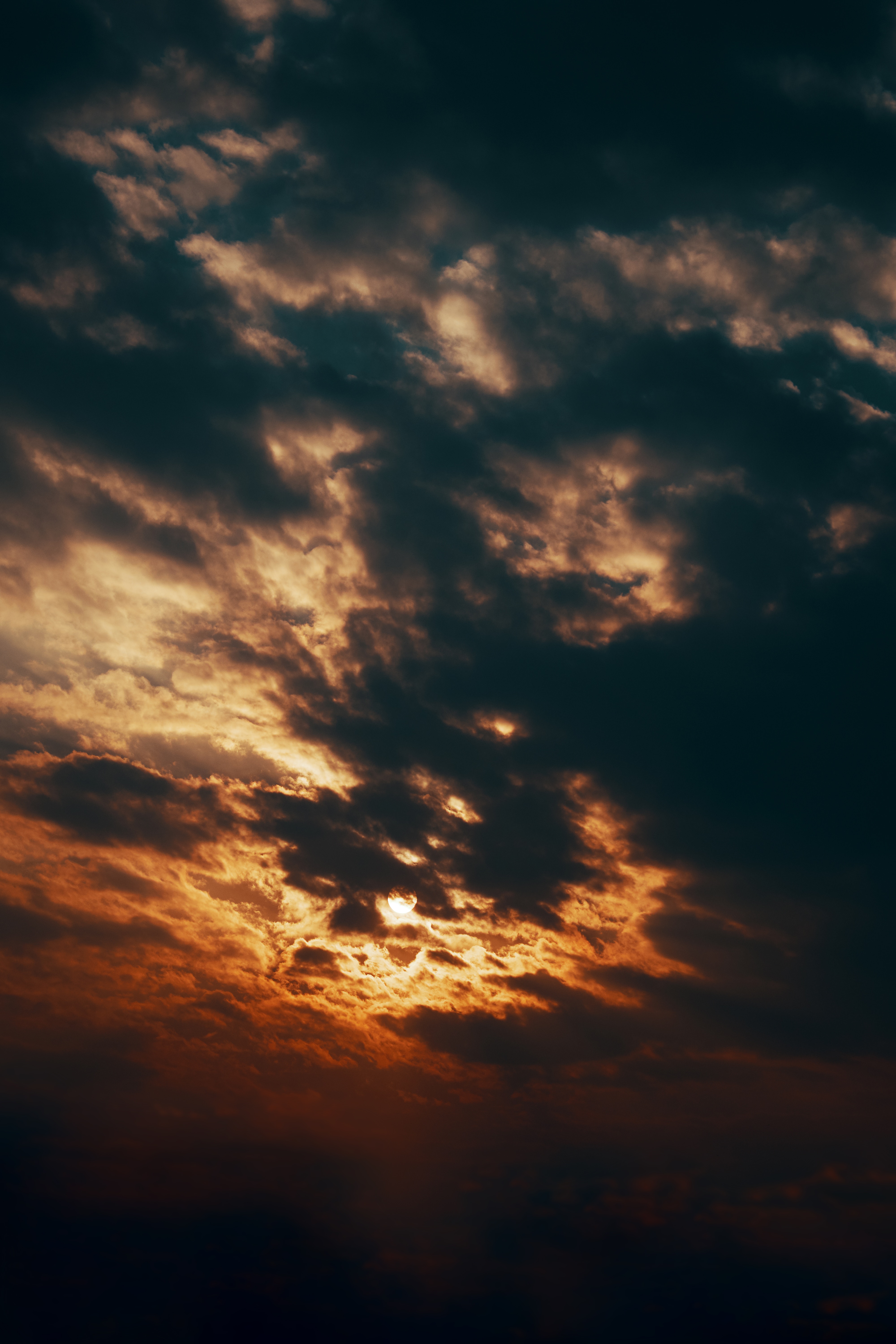 Download mobile wallpaper Hide, Clouds, Sky, Sun, Sunset, Dark for free.