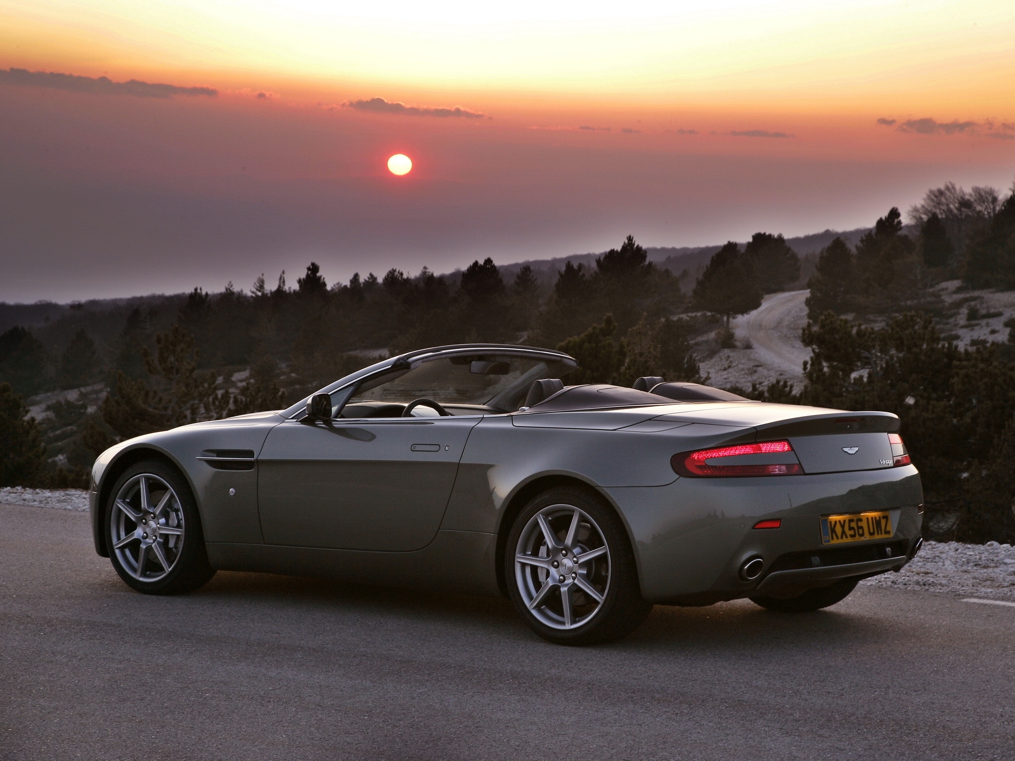 HD wallpaper auto, trees, sunset, aston martin, cars, grey, side view, v8, 2006