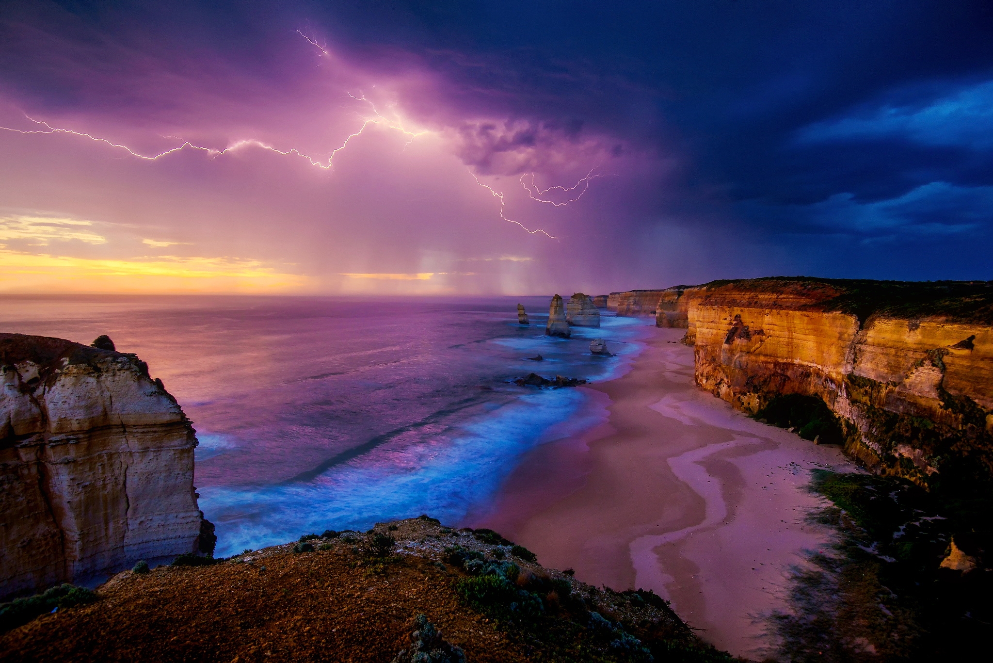 Download mobile wallpaper Sky, Sea, Beach, Sand, Lightning, Horizon, Ocean, Earth, Australia, The Twelve Apostles for free.