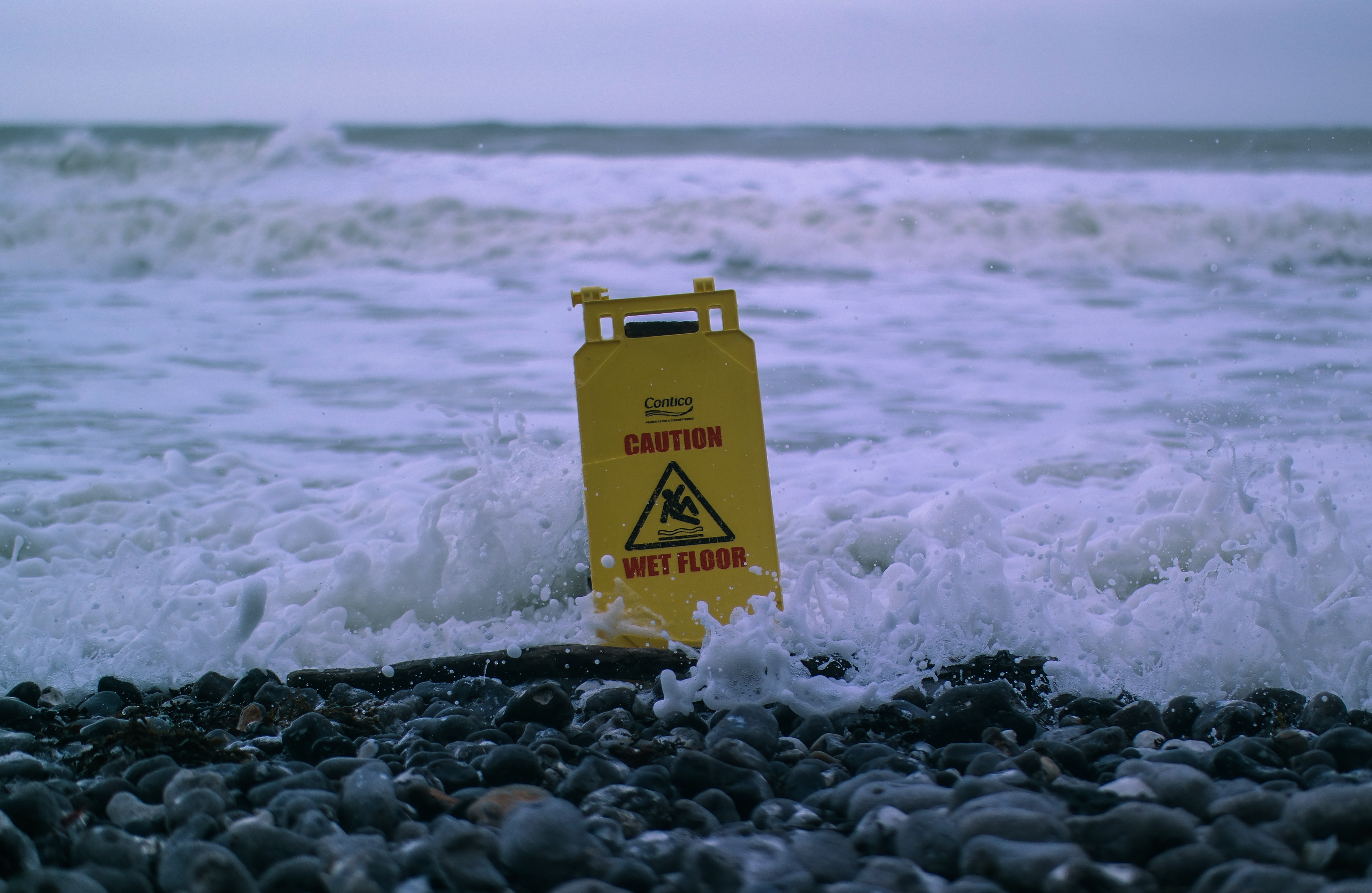 sign, nature, stones, sea, foam, caution Phone Background