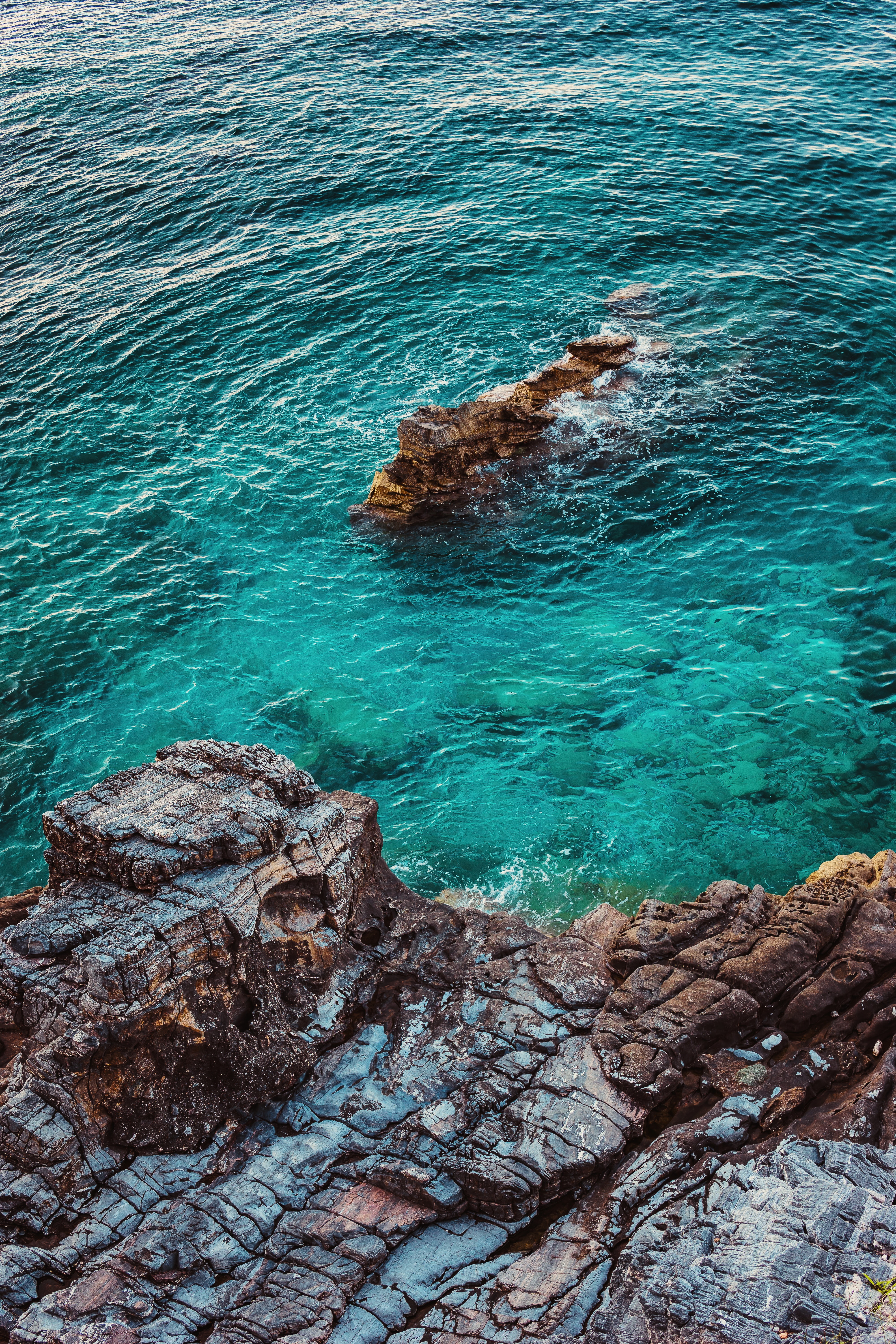 Download mobile wallpaper Rocks, Sea, Coast, Nature, View From Above, Water for free.
