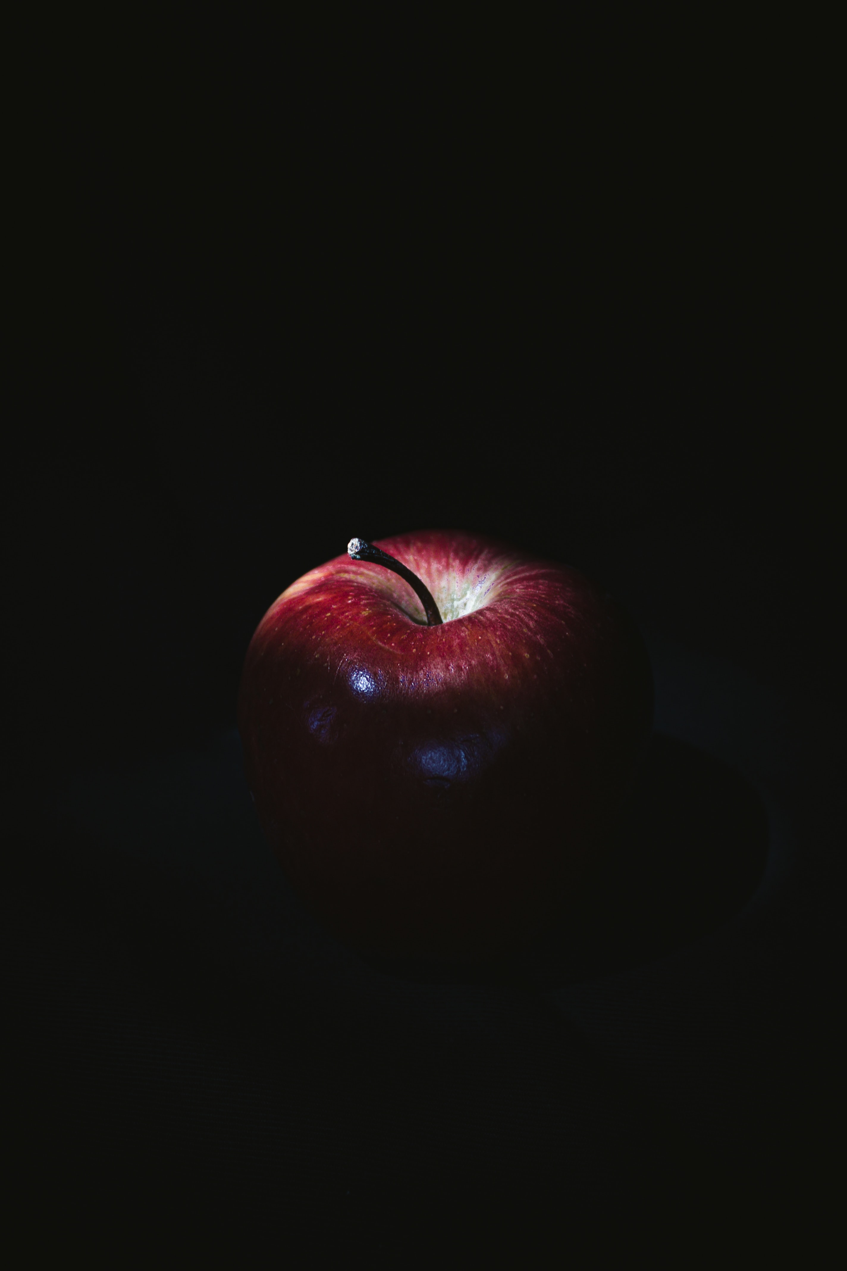 Download mobile wallpaper Fruit, Food, Shadow, Dark, Apple for free.