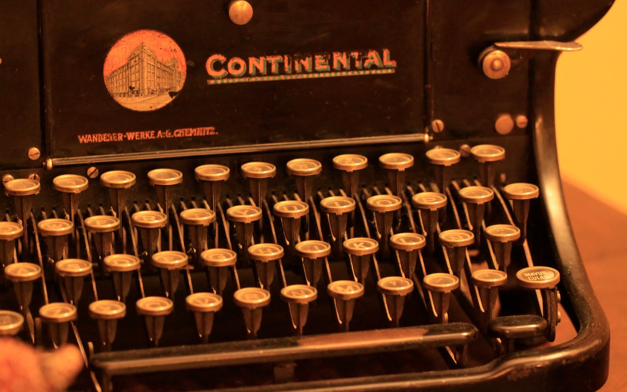 man made, typewriter cellphone