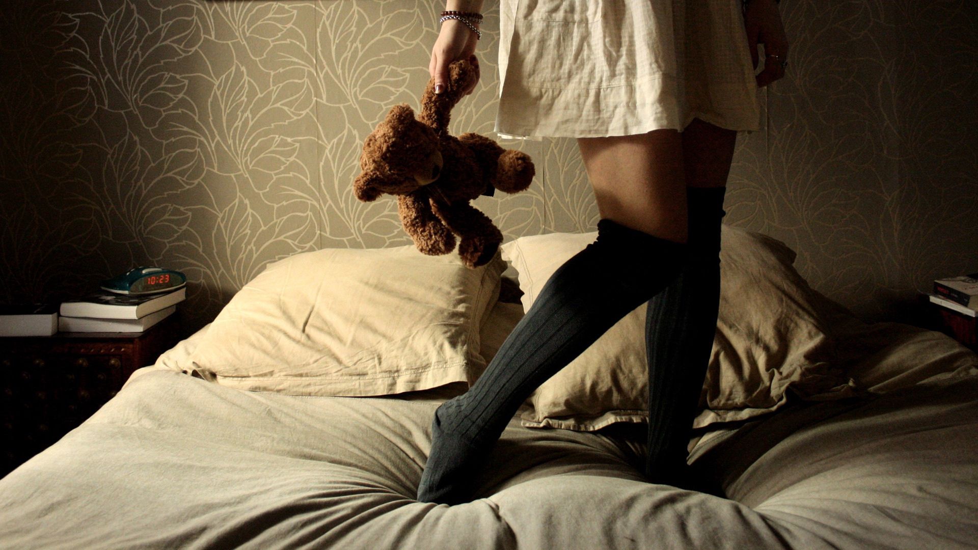 books, miscellanea, miscellaneous, legs, toy, girl, room, bed, cushions, pillows, knee socks