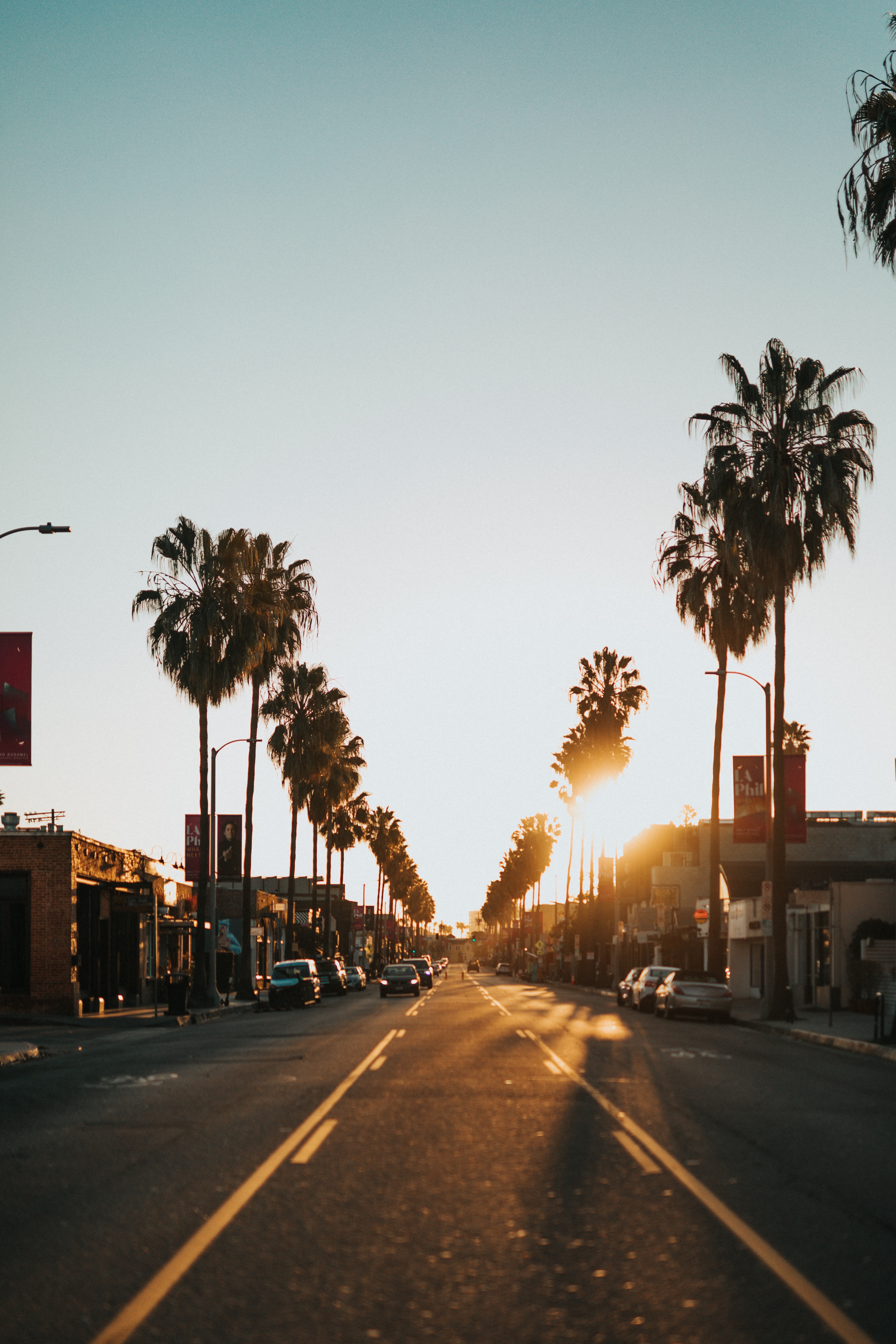 Download mobile wallpaper Auto, Palms, City, Street, Cities, Sunset for free.