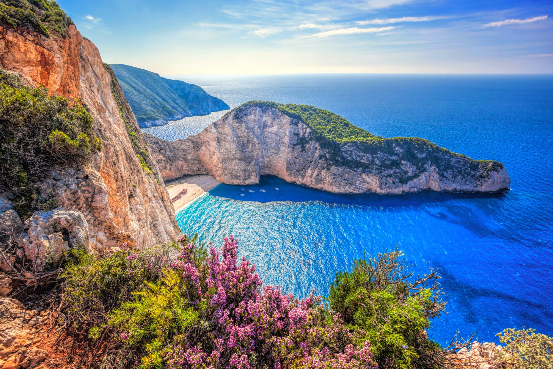 greece, navagio beach, sea, beach, earth, ocean, cliff, flower, horizon phone wallpaper