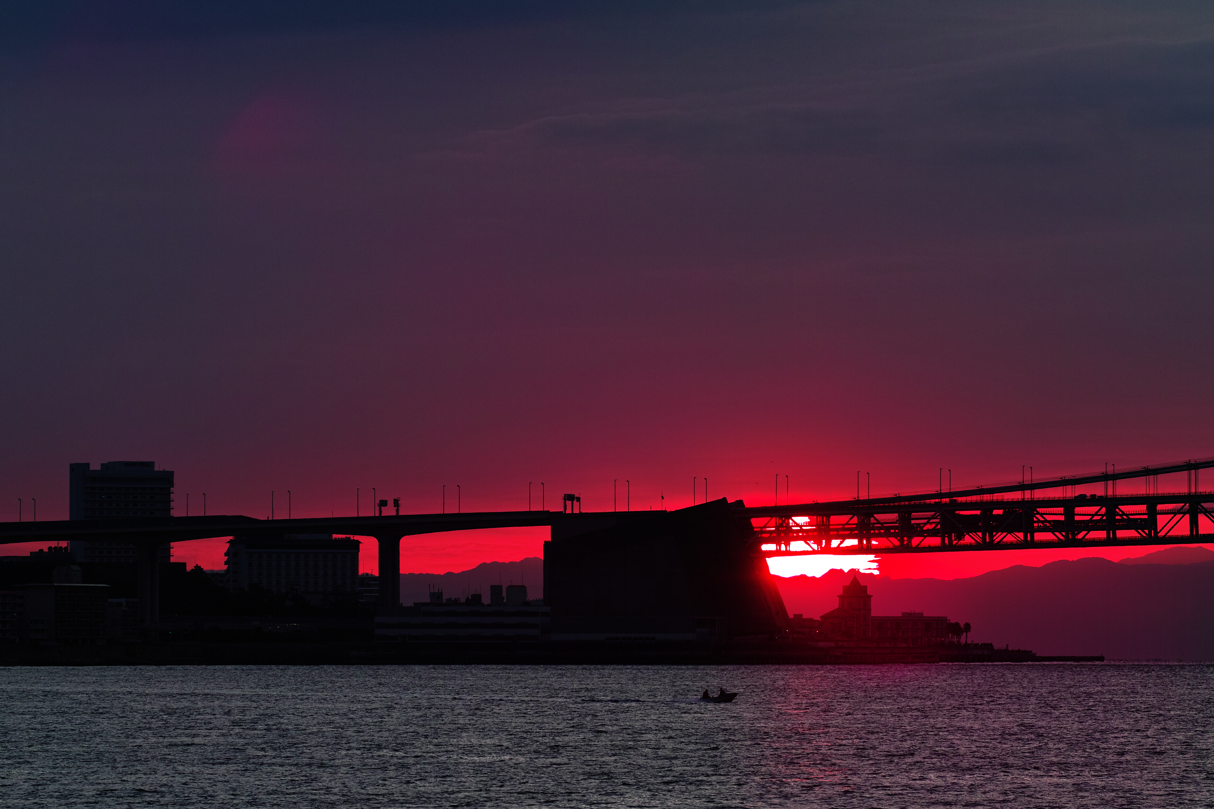 Wallpaper Full HD sunset, cities, rivers, twilight, red, dusk, bridge, evening