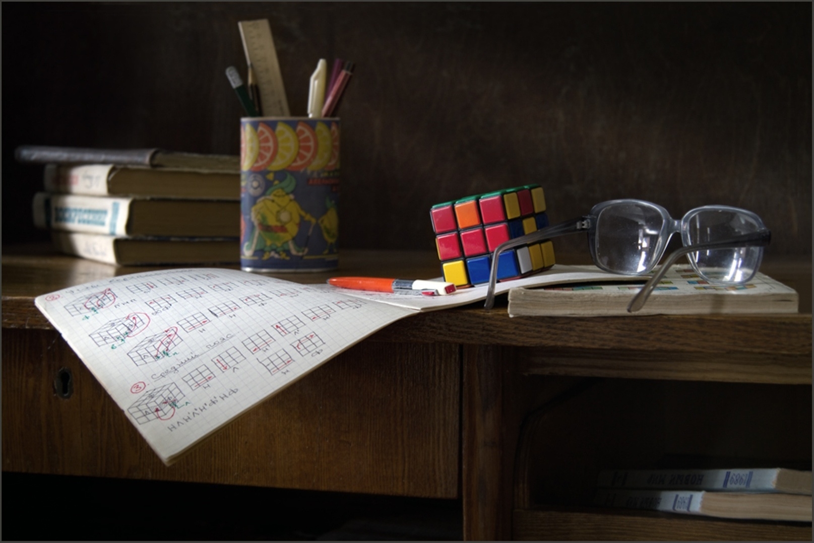 books, rubik's cube, miscellanea, miscellaneous, table, glasses, spectacles, pens, handles, ruler, instructions, instruction phone wallpaper