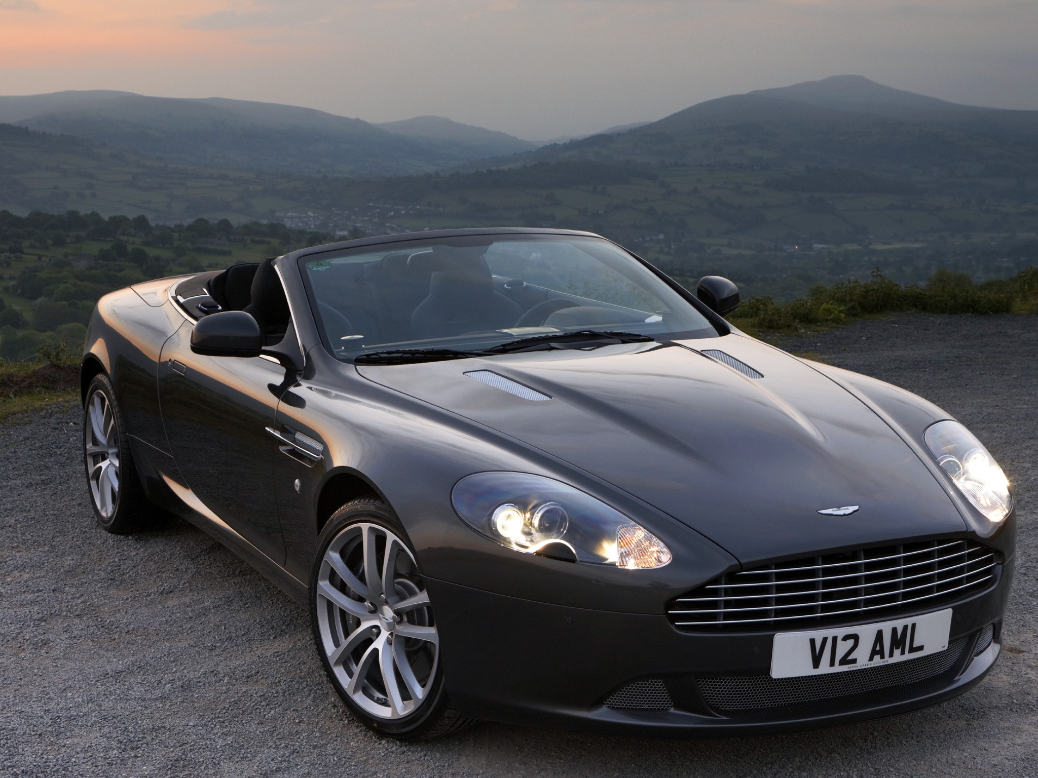 auto, mountains, aston martin, cars, black, front view, style, db9, 2010 lock screen backgrounds
