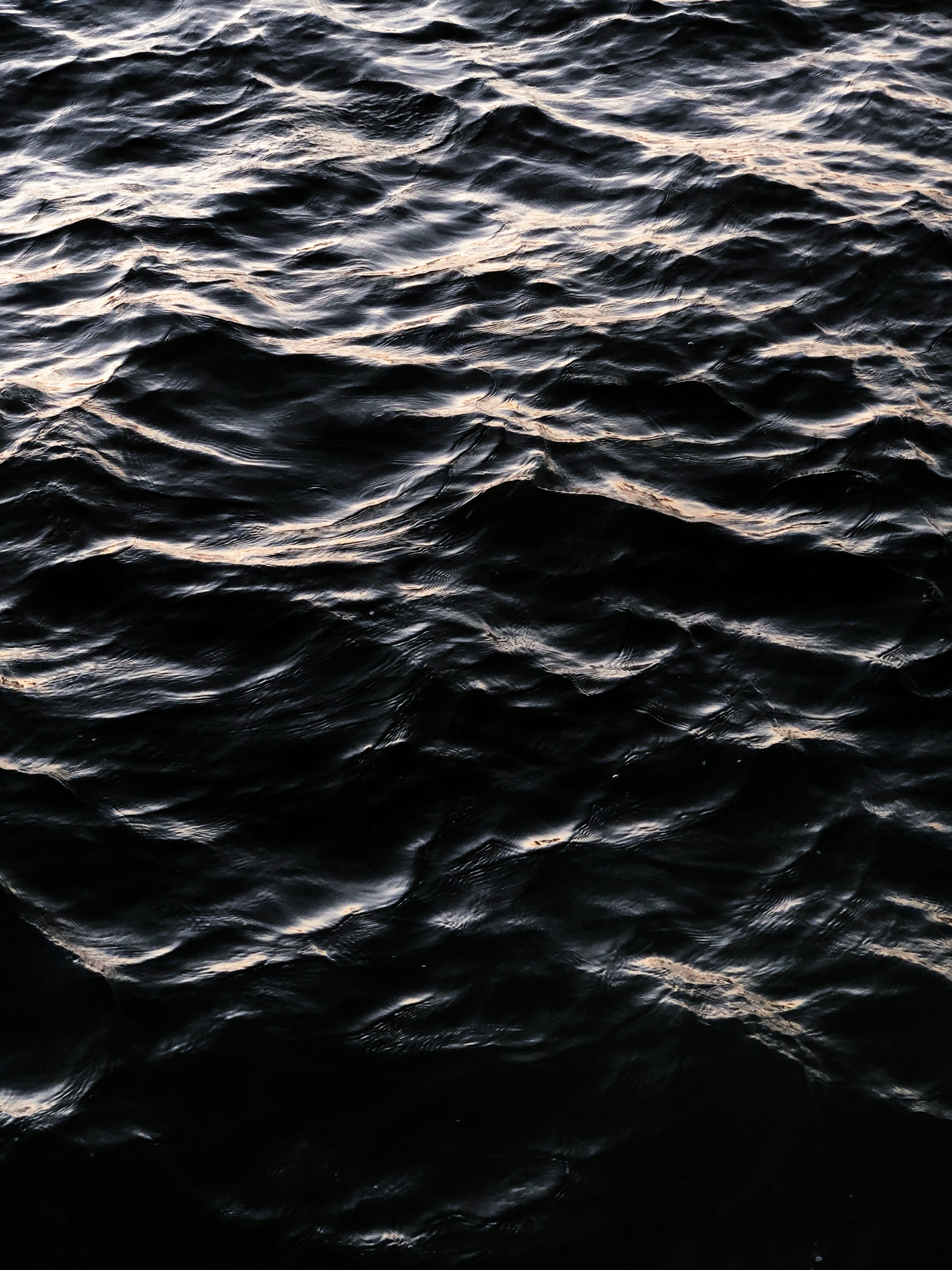 Download mobile wallpaper Glare, Wavy, Waves, Water, Nature, Dark for free.