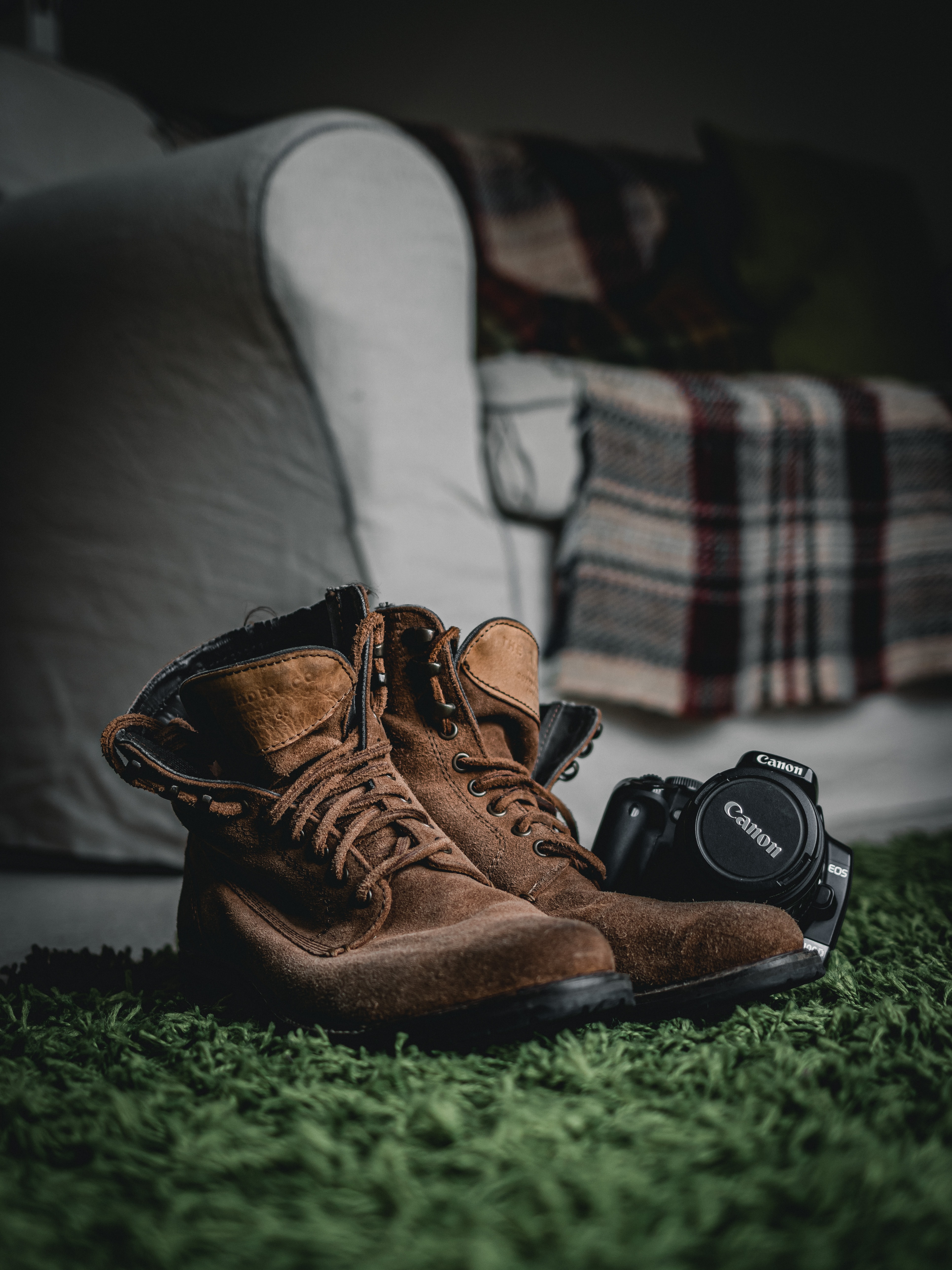 Download mobile wallpaper Boots, Miscellaneous, Miscellanea, Room, Shoes, Sofa, Camera for free.