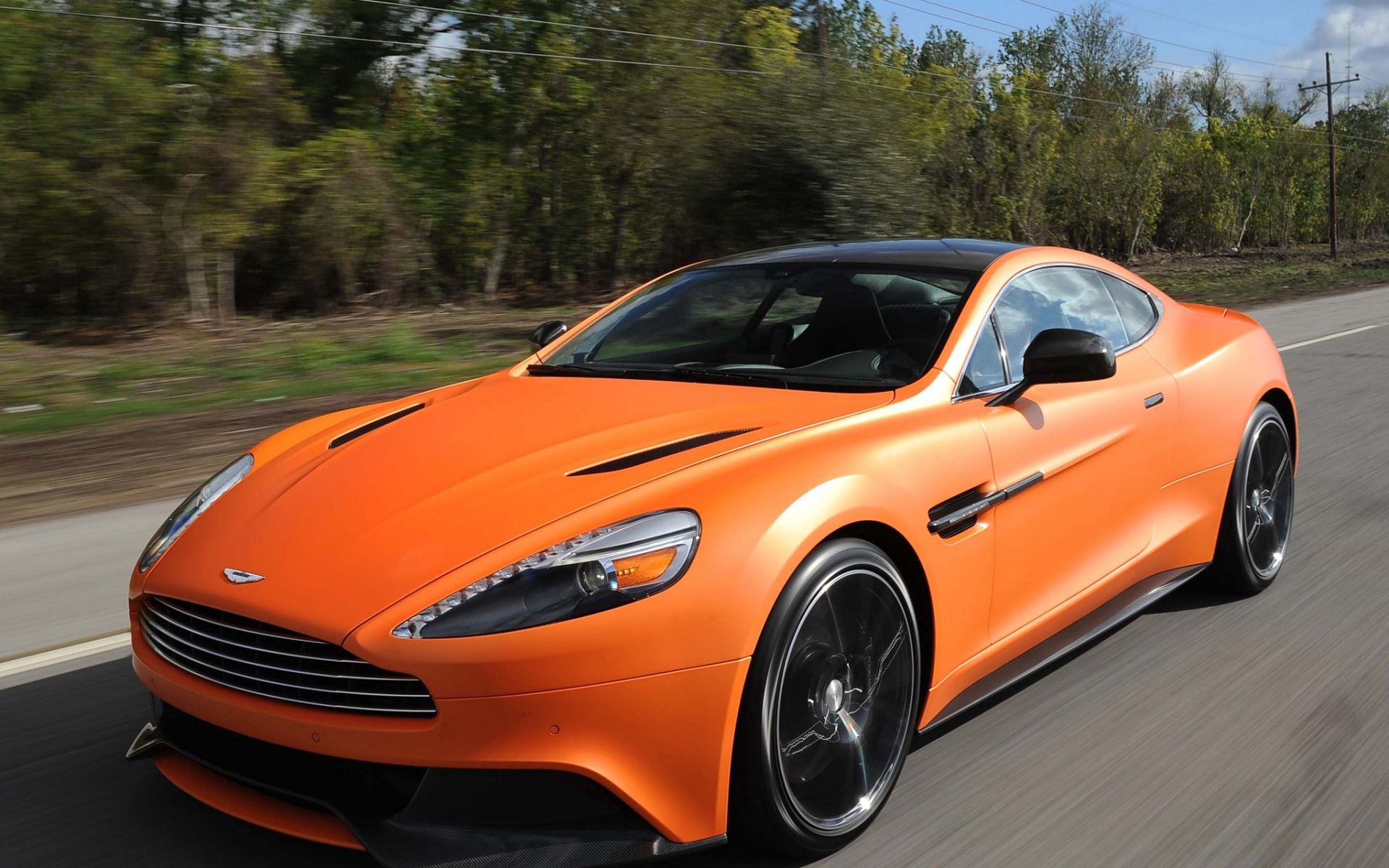 Download mobile wallpaper Vanquish Orange, Speed, Front View, Aston Martin, Cars for free.