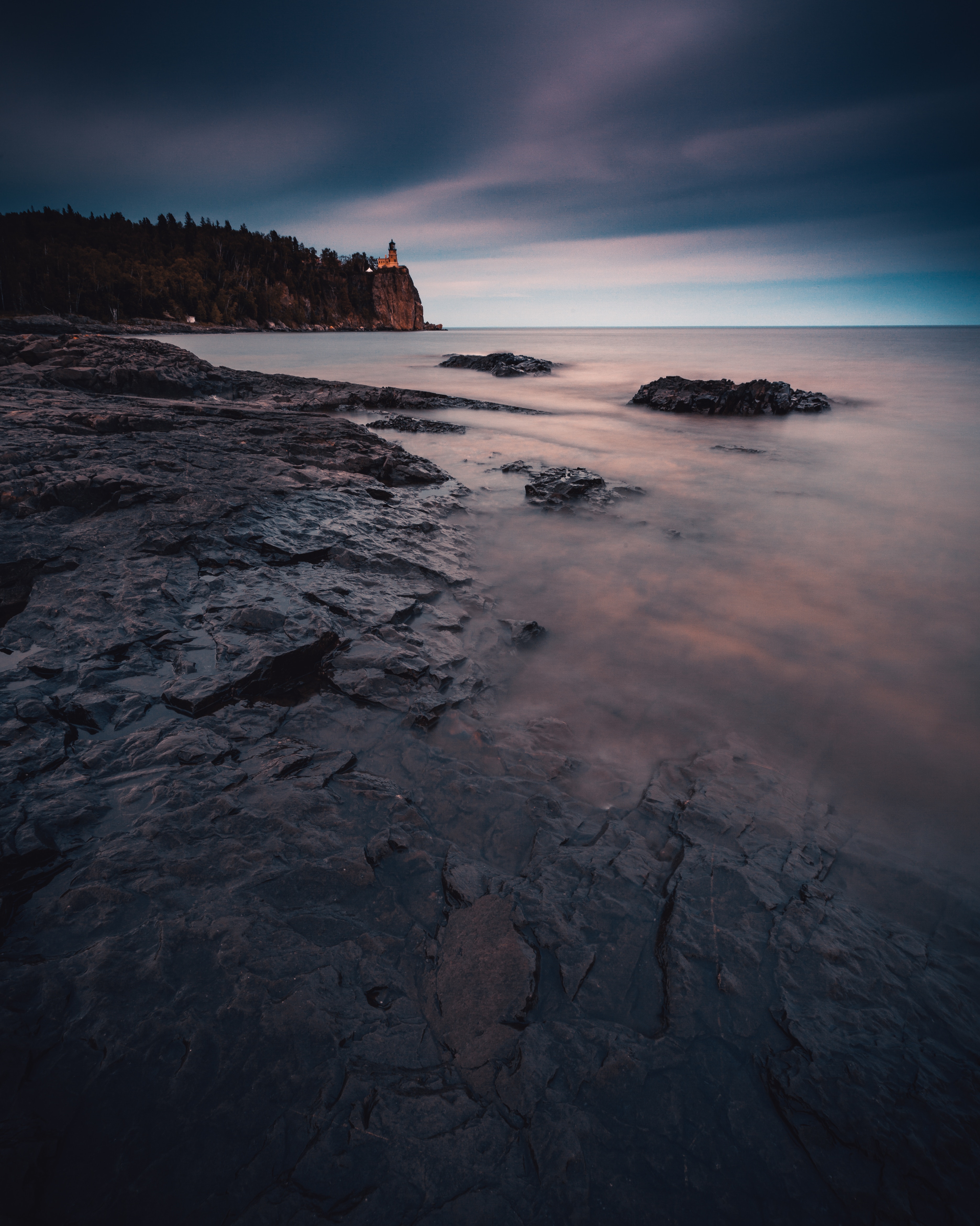 stones, shore, nature, water, sunset, sea, bank, fog Smartphone Background