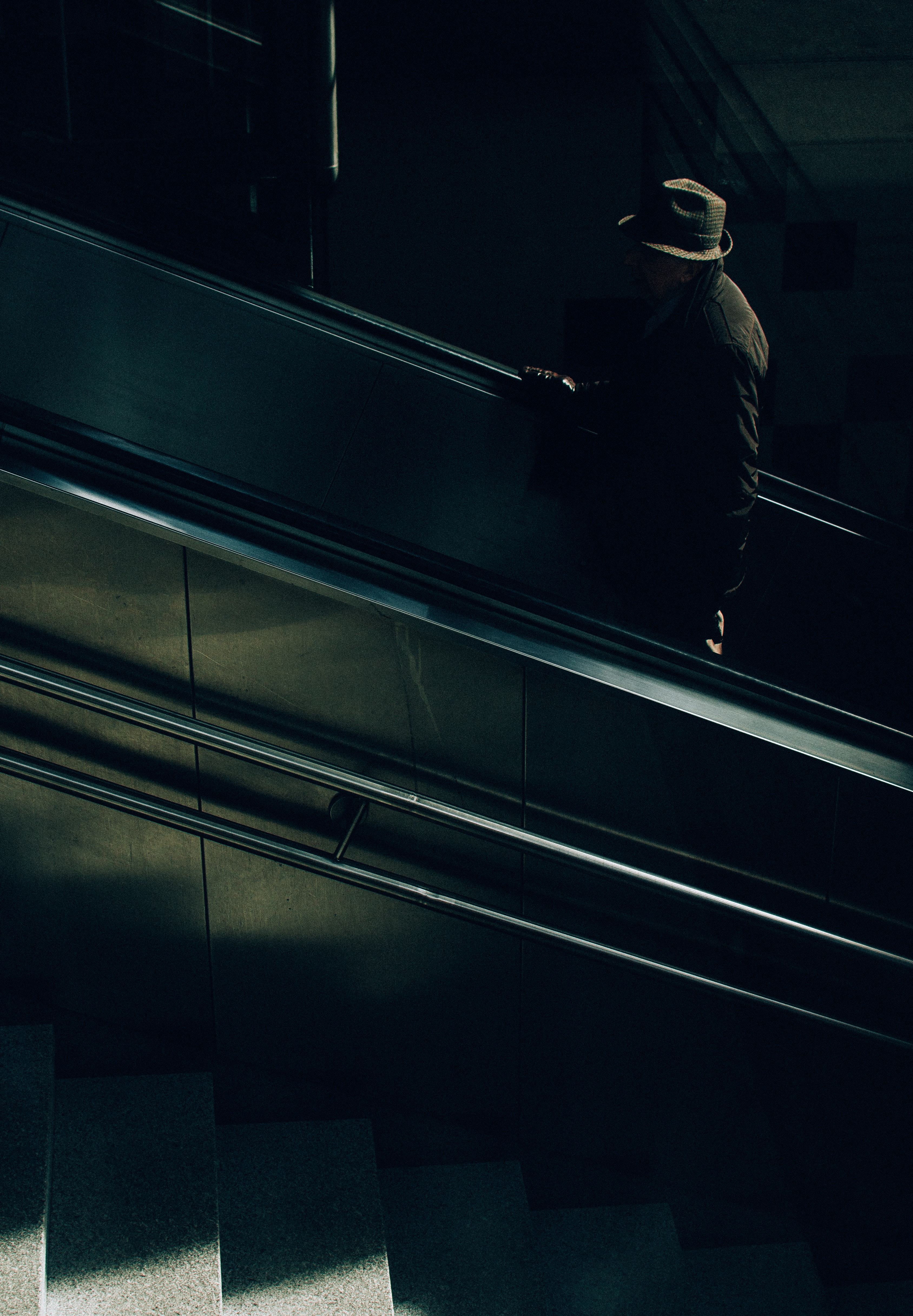 Download mobile wallpaper Ladder, Stairs, Person, Human, Dark, Anonymous for free.