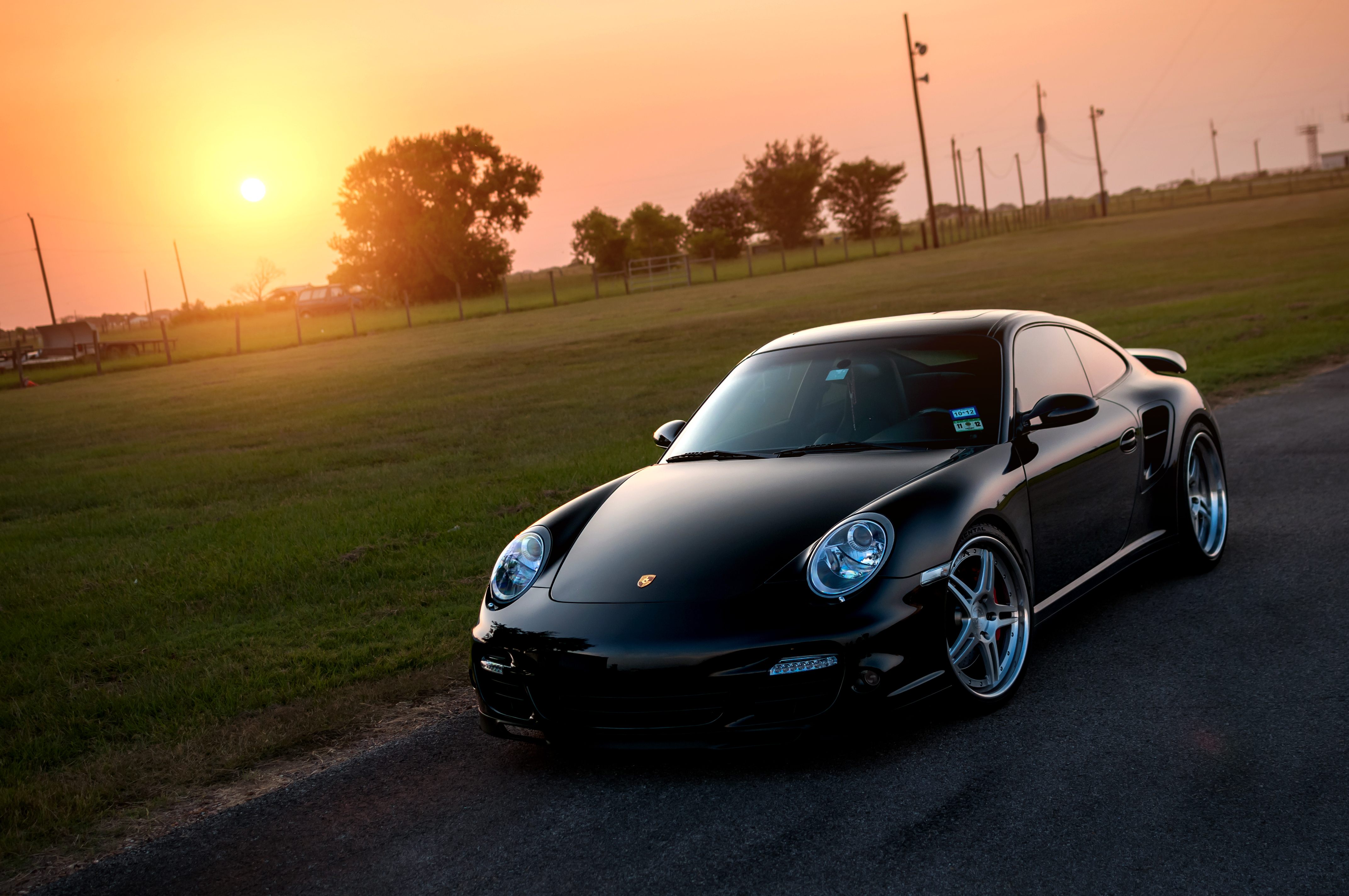 cars, porsche, lawn, black, sun, glare, 911, 997, front, turbo wallpapers for tablet