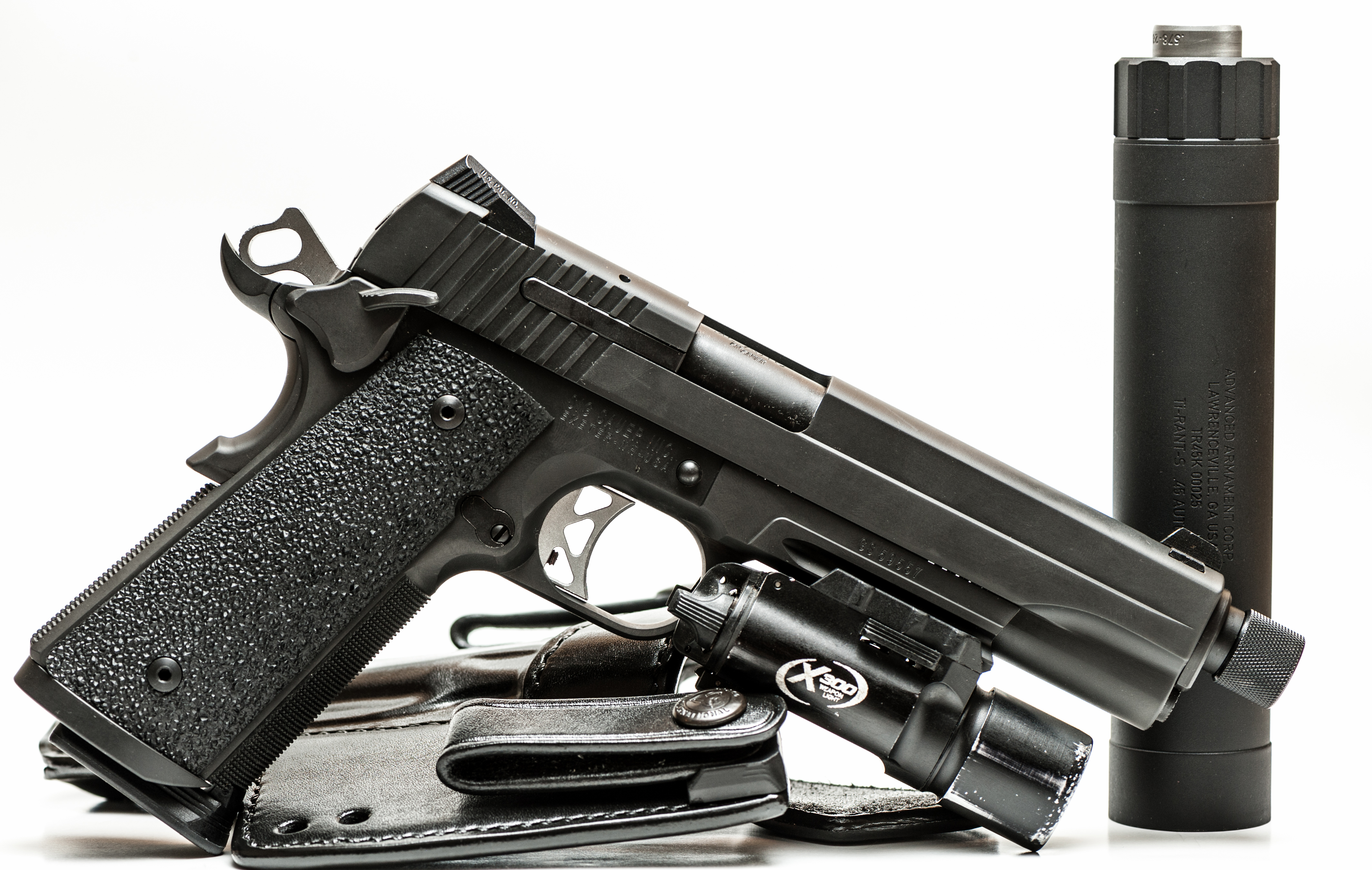 HD wallpaper: Nighthawk Custom Pistol And Bullets, black semi-automatic  pistol and four brass-colored bullets | Wallpaper Flare