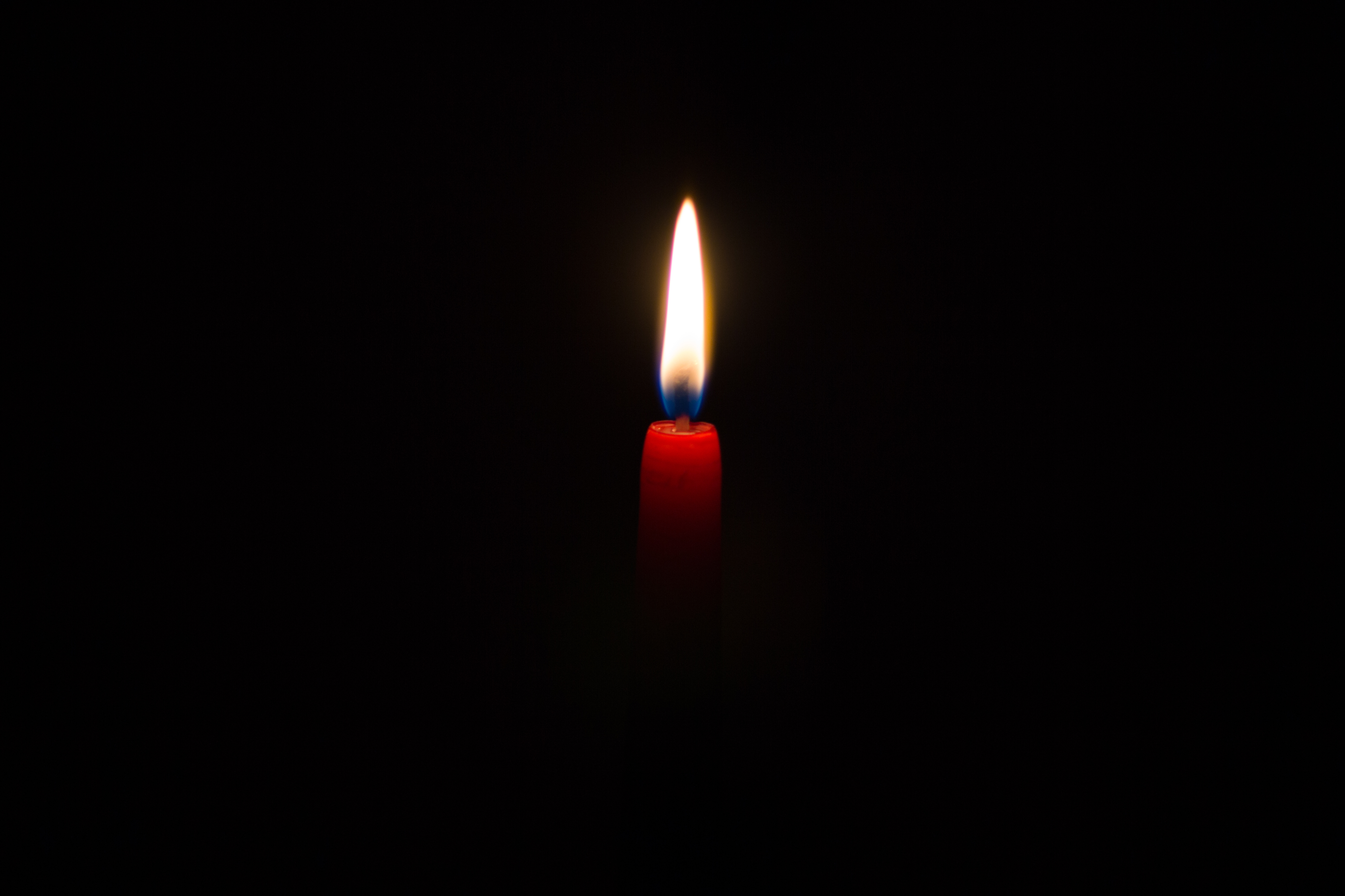 candle, dark background, wax, flame, minimalism