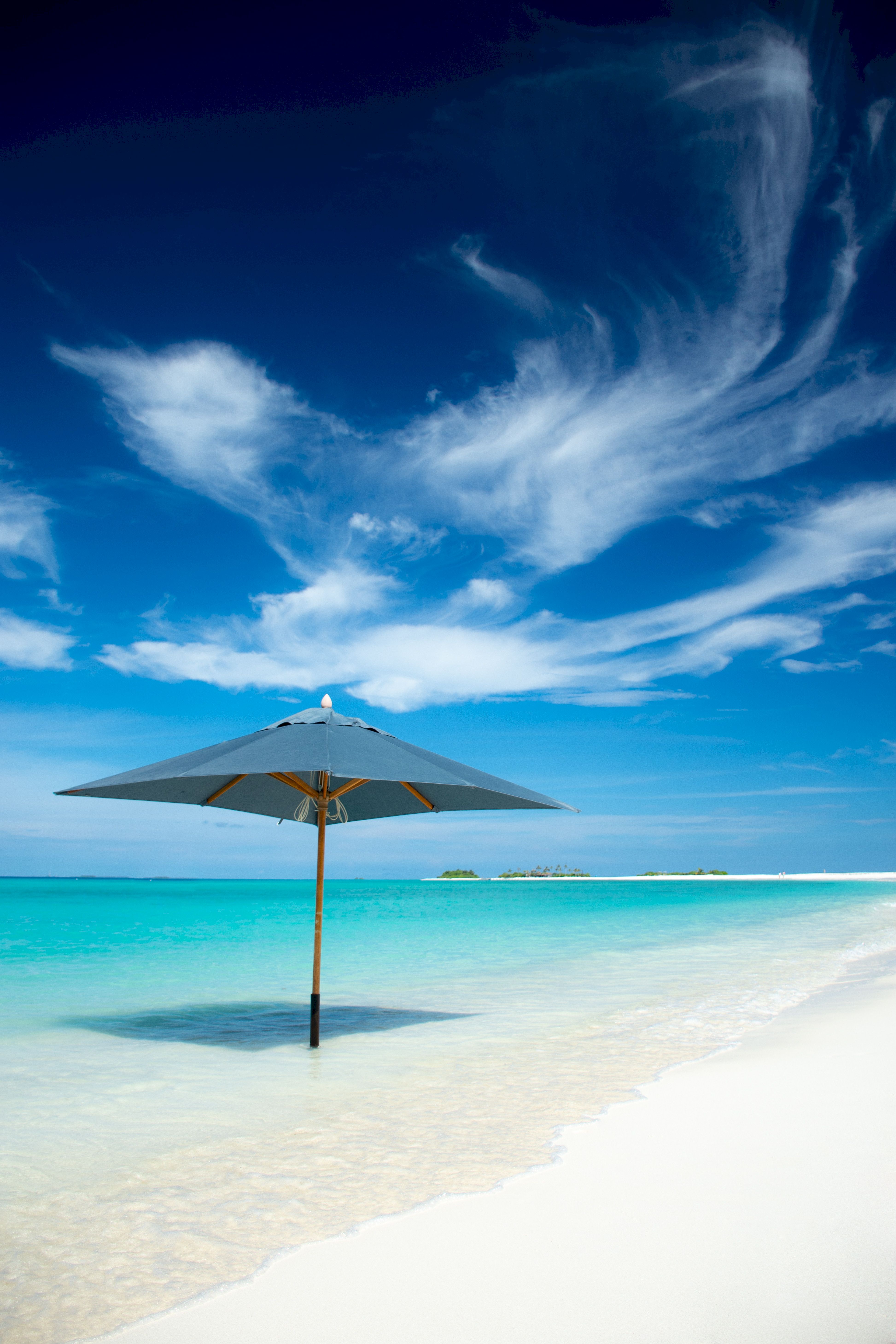 ocean, tropics, nature, clouds, horizon, shore, bank, umbrella Free Stock Photo