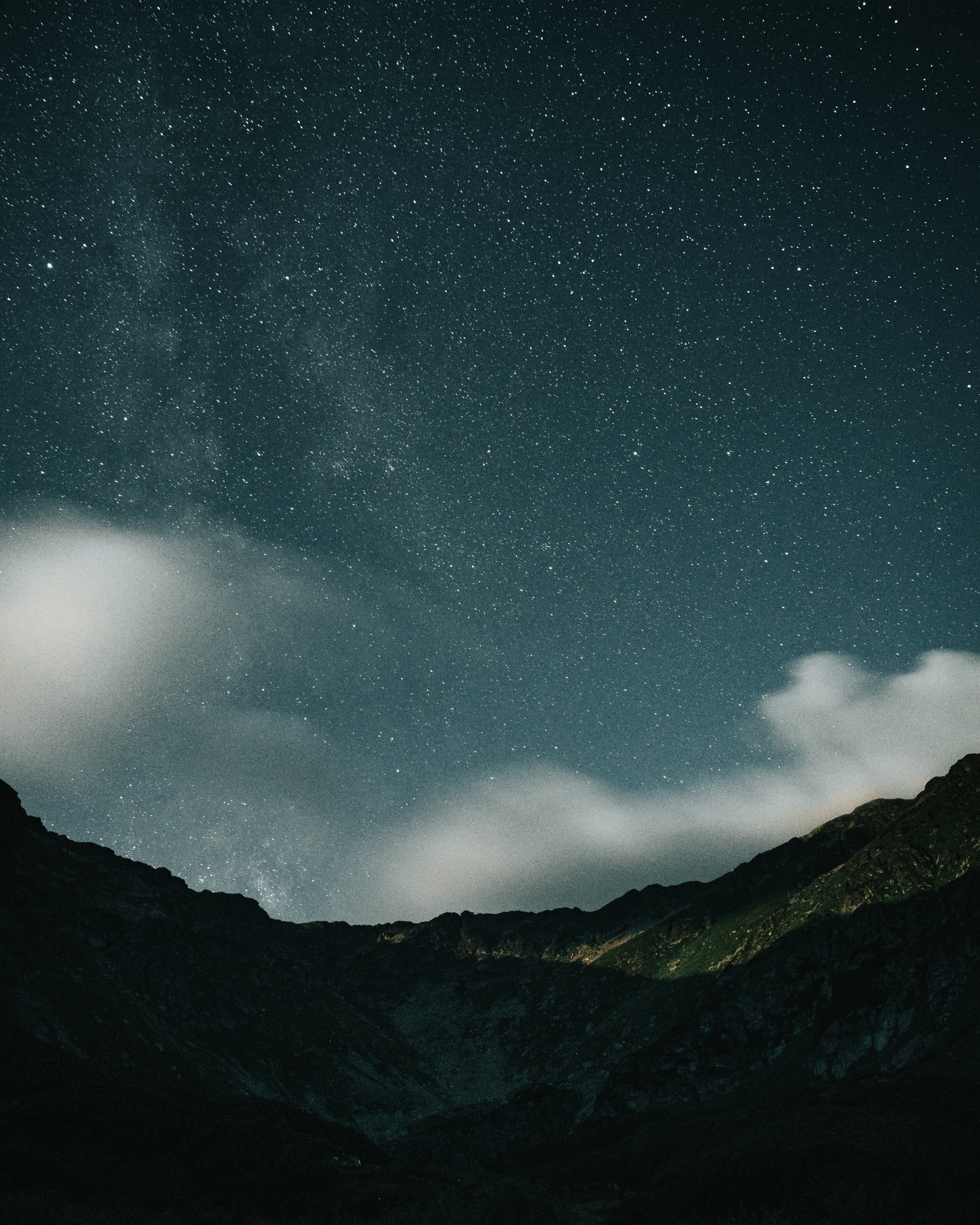 Download mobile wallpaper Clouds, Rocks, Mountains, Nature, Starry Sky, Stars, Night for free.
