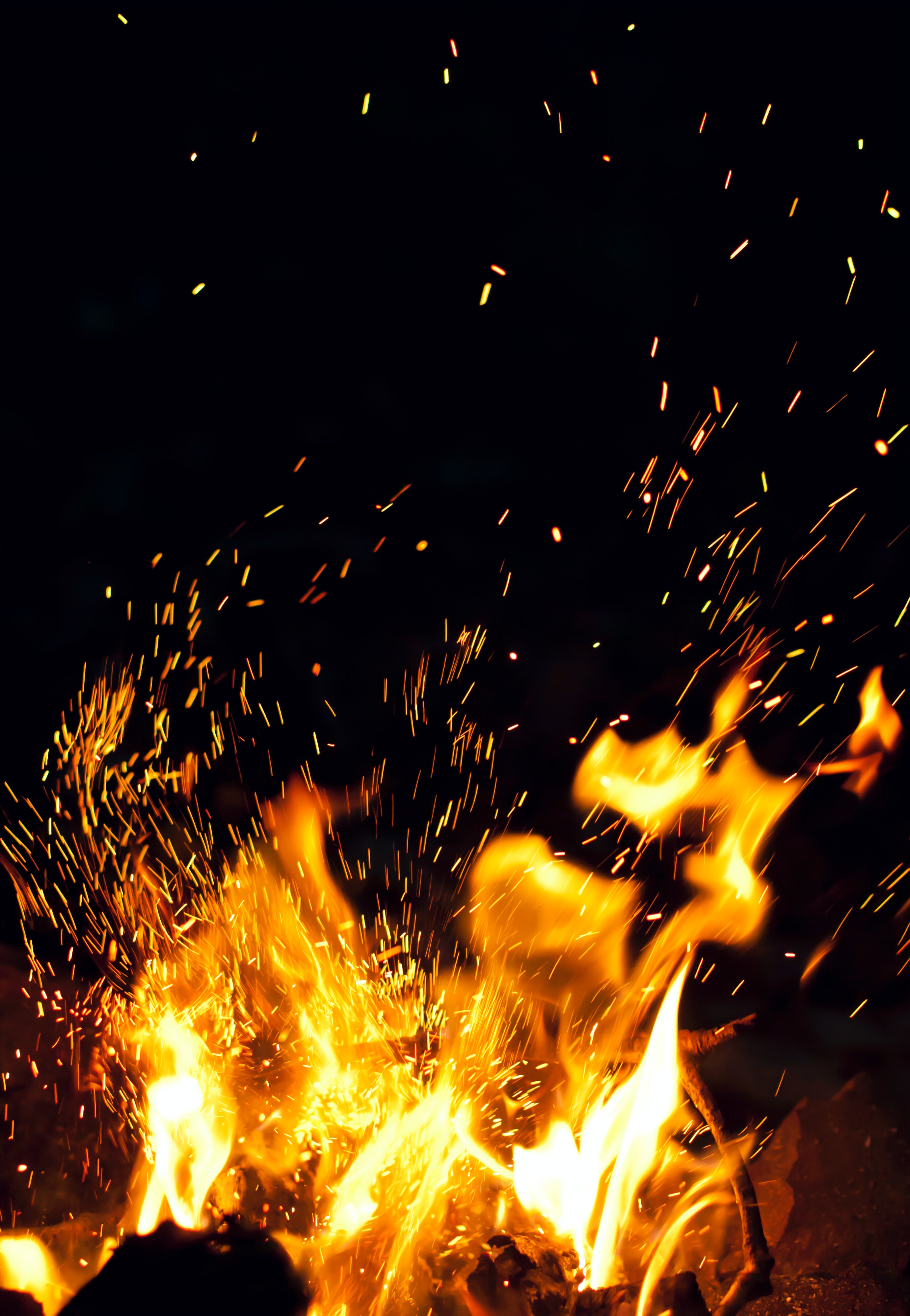 Download mobile wallpaper Sparks, Night, Bonfire, Fire, Dark for free.