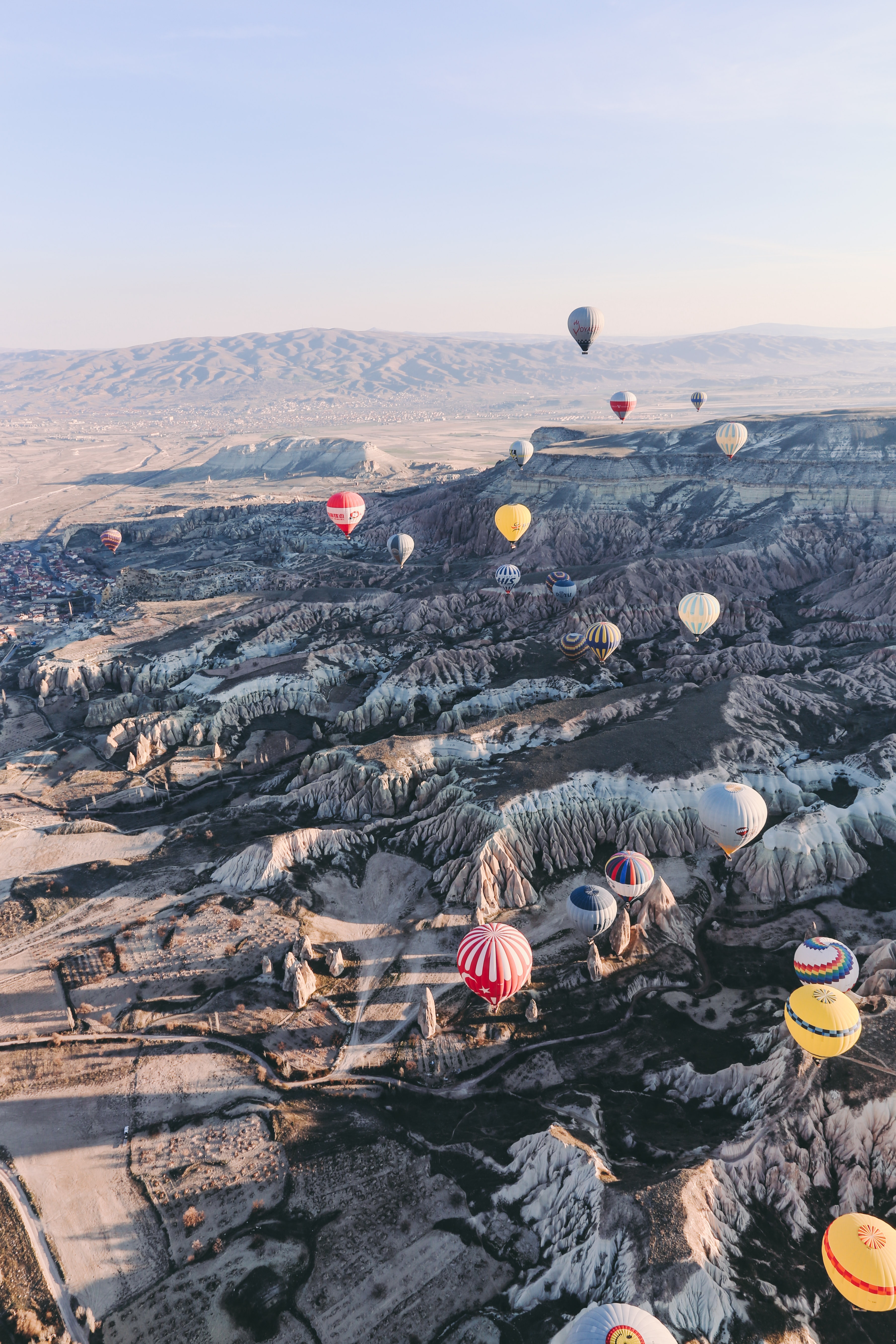 Mobile wallpaper balloons, rocks, cappadocia, nature, view from above, flight, goreme, gereme