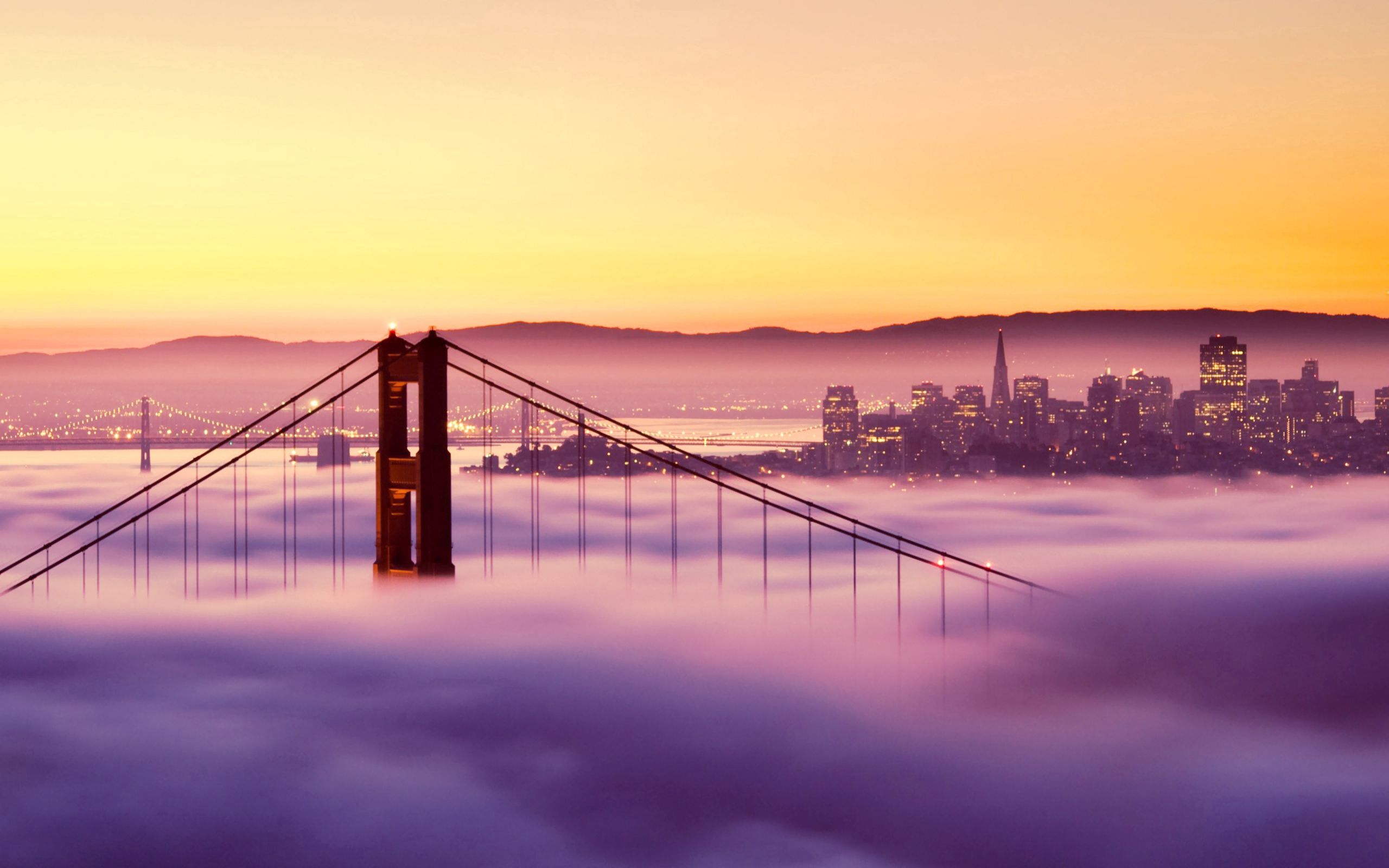 Скачать картинку Огни, Мост, Здания, Туман, Города, Закат, Сан Франциско в телефон бесплатно.
