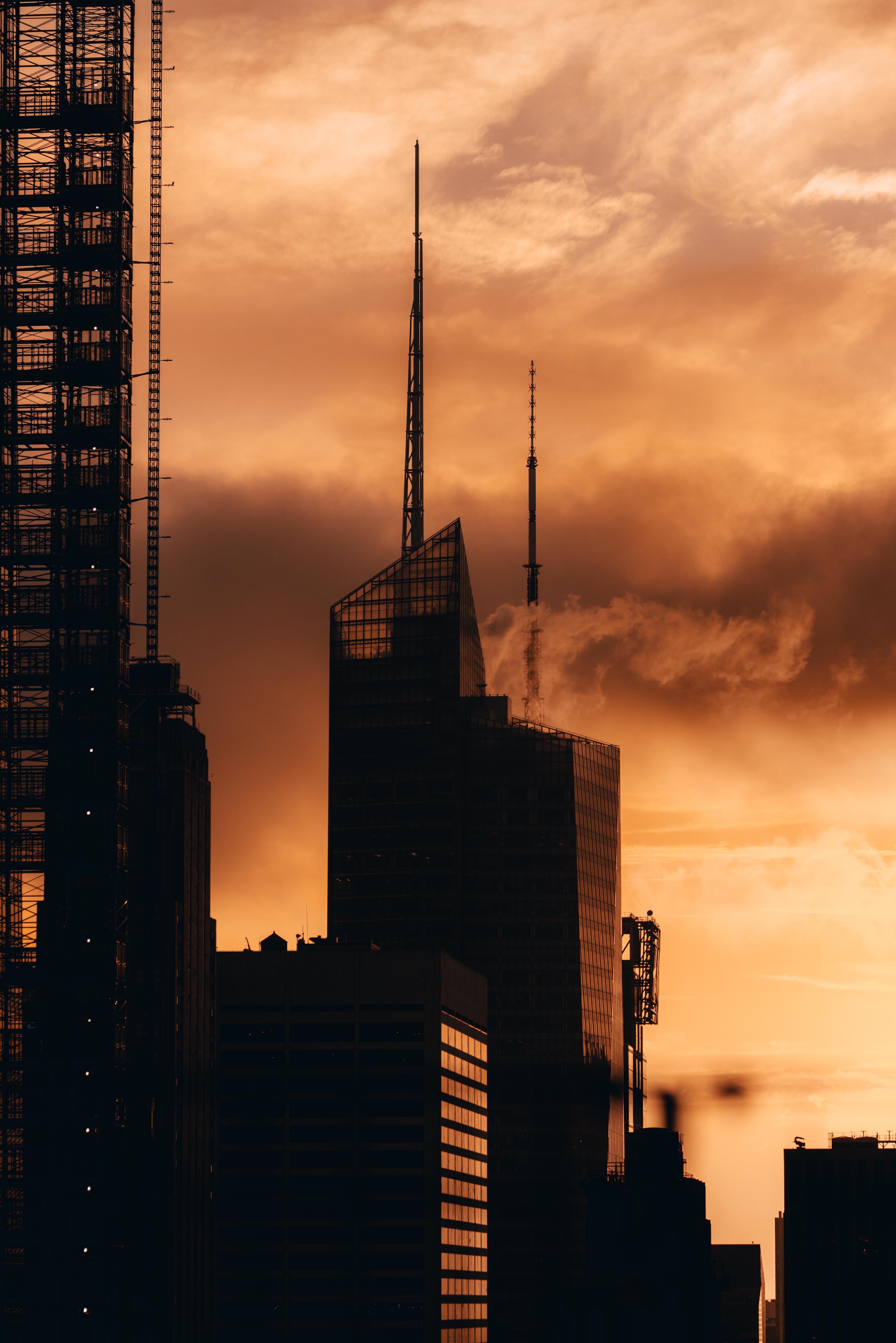 Download mobile wallpaper Cities, Building, City, Architecture, Silhouette, Sunset for free.