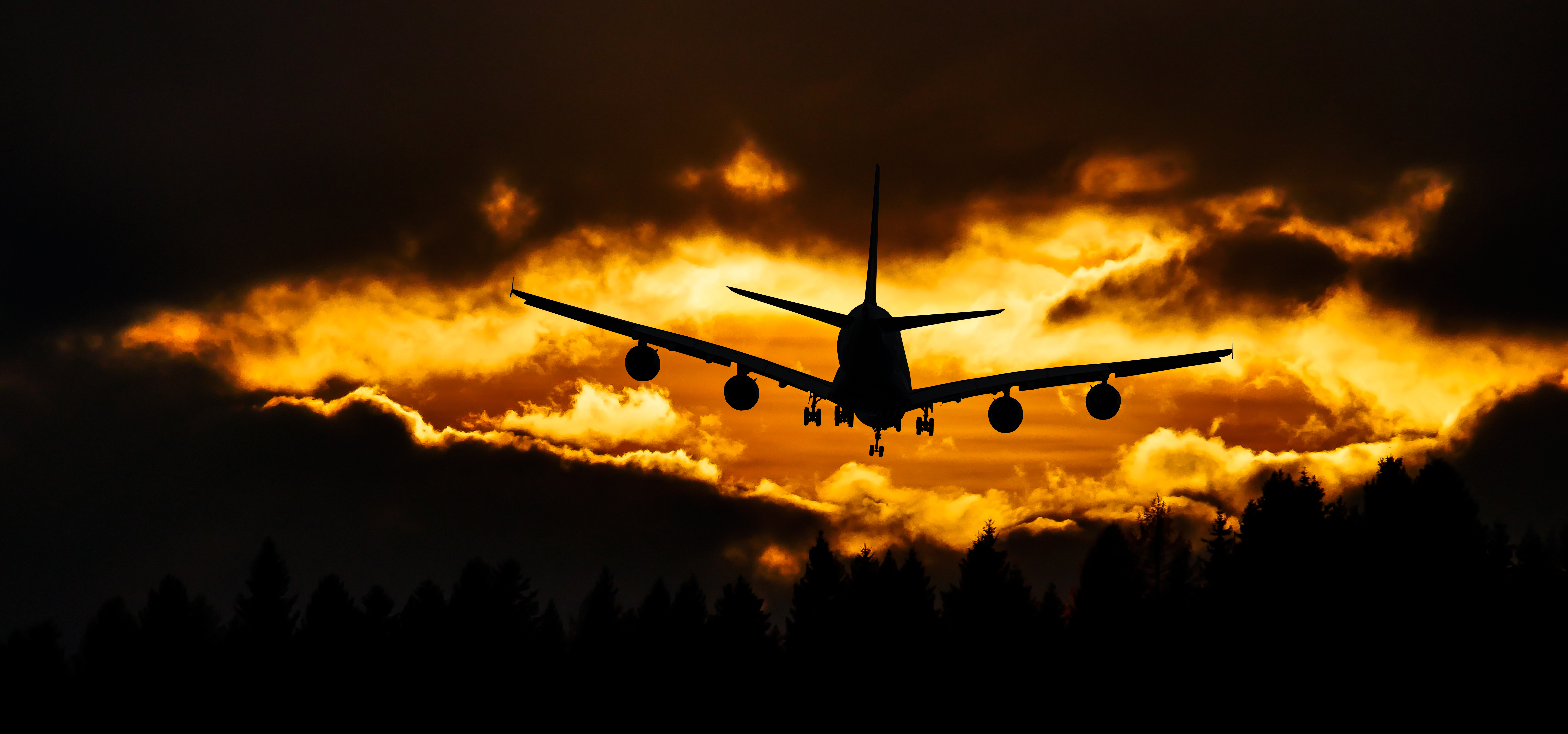 Download mobile wallpaper Sky, Clouds, Sunset, Dark, Airplane, Plane for free.