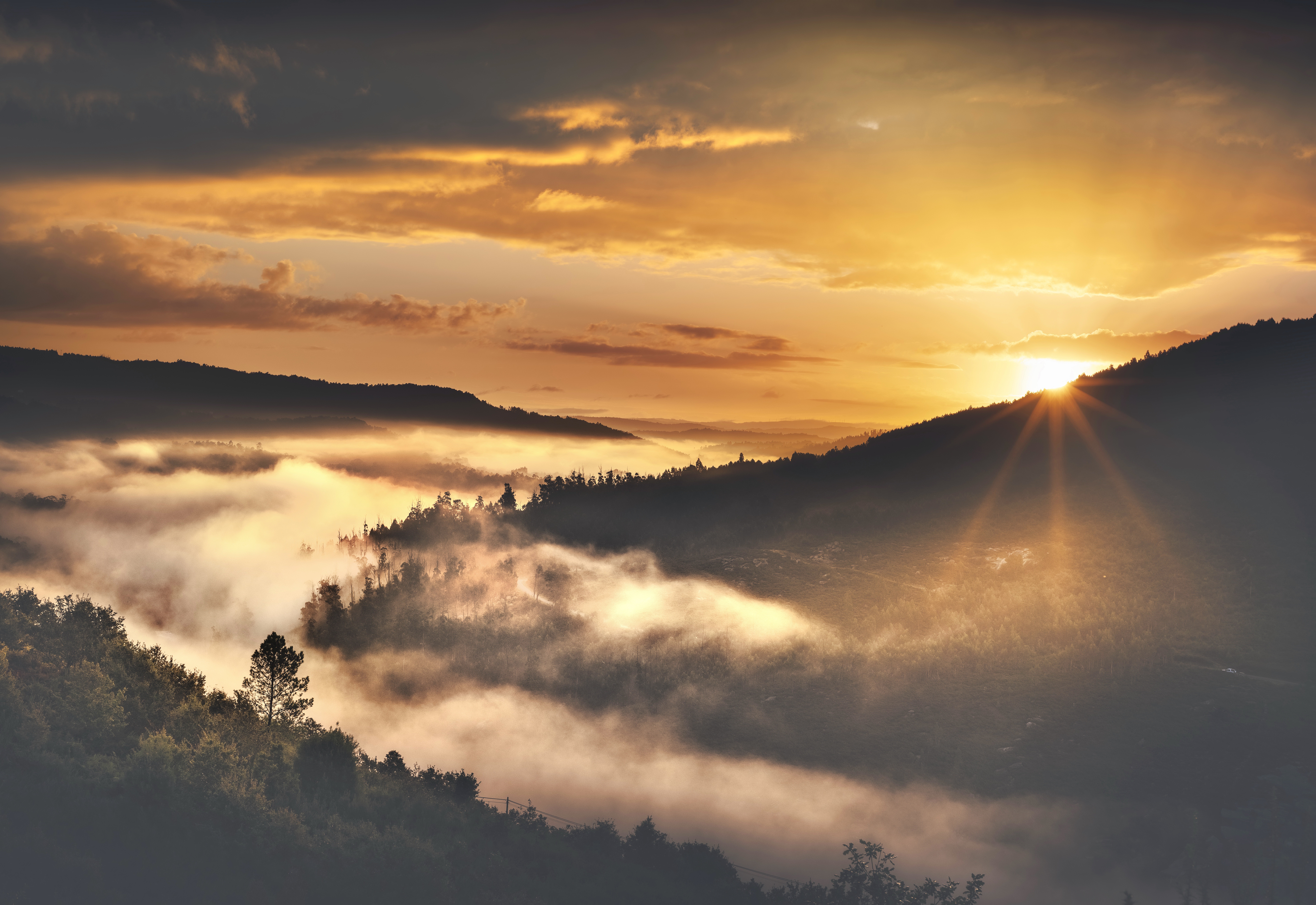 A sunset over a valley HD wallpaper 4k background