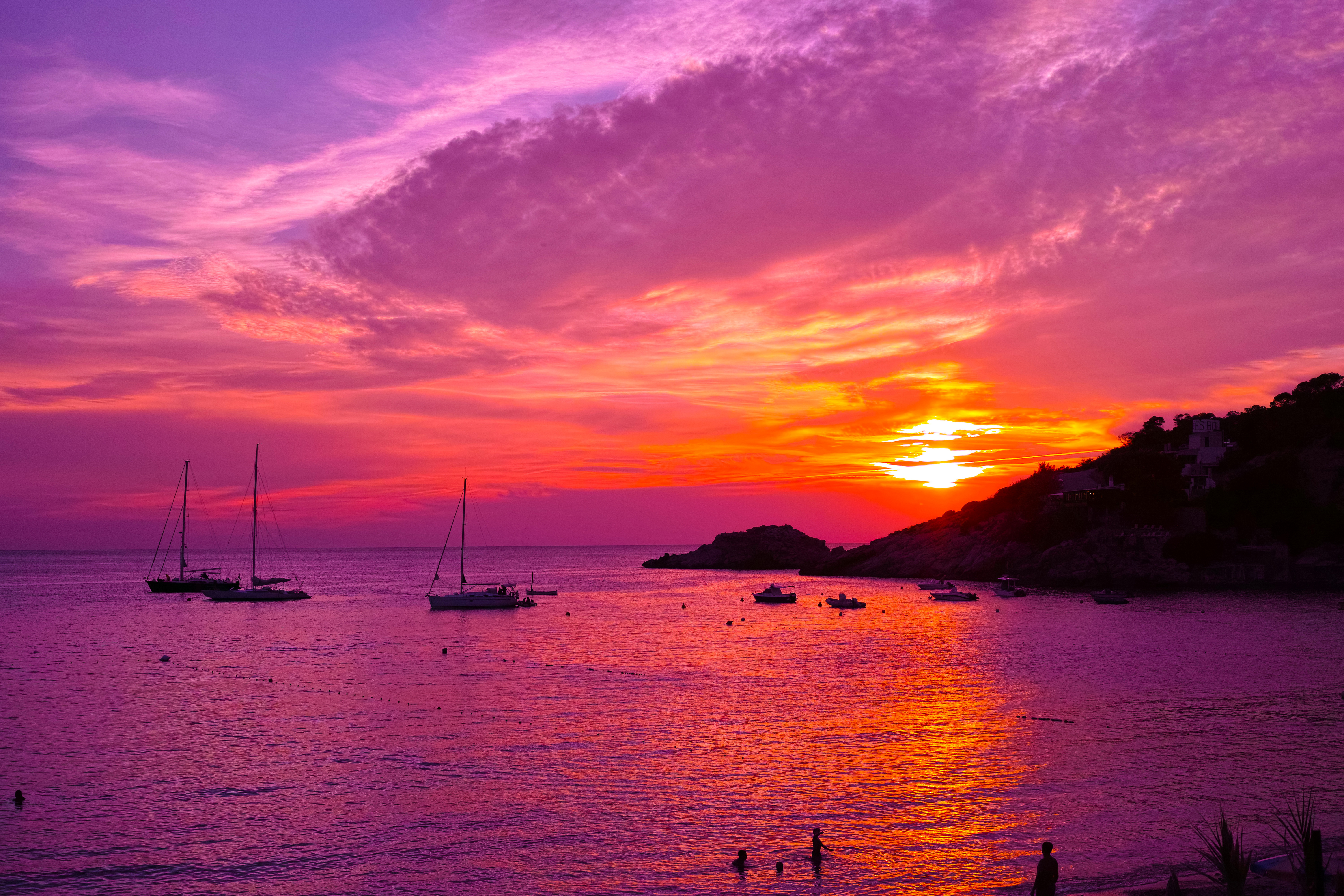 Download mobile wallpaper Sunset, Sky, Ocean, Boat, Purple, Spain, Photography, Ibiza, Orange (Color) for free.
