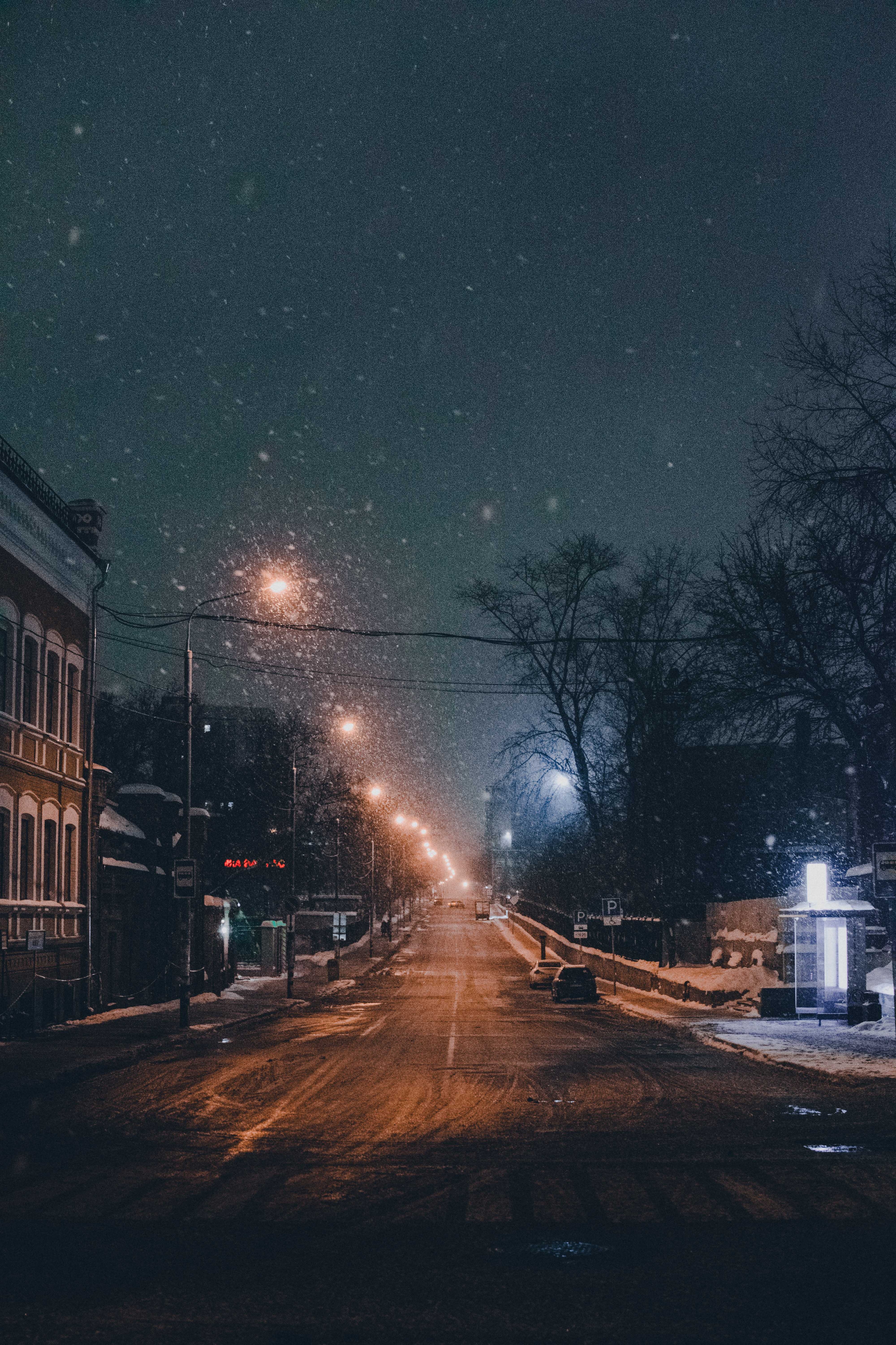 Download mobile wallpaper Snowfall, Cities, Dusk, Winter, Road, Night City, Twilight for free.