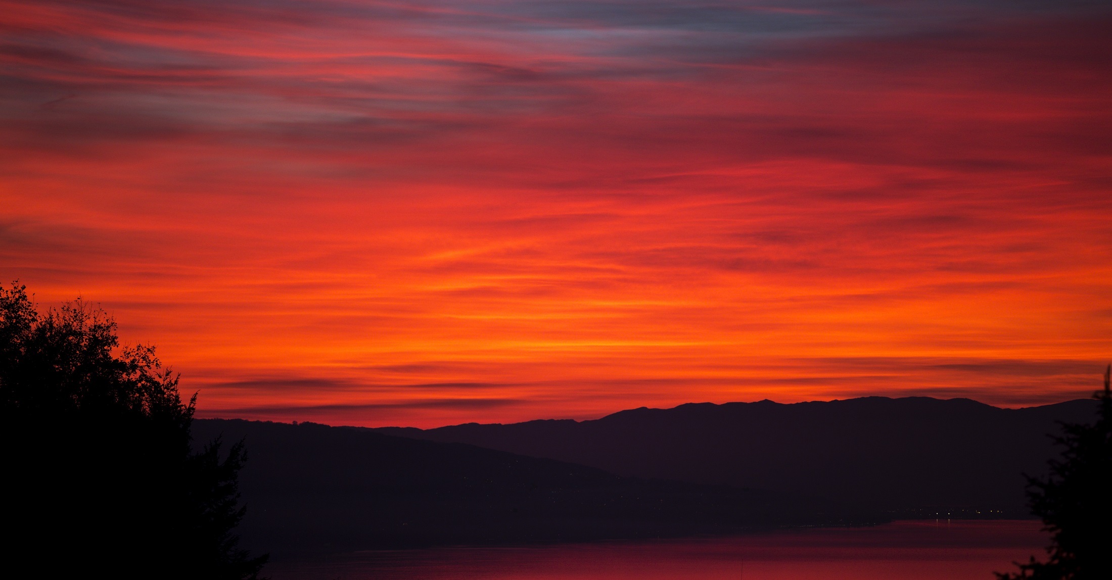 Free download wallpaper Nature, Sunset, Sky, Silhouette, Earth, Dusk, Hill, Orange (Color) on your PC desktop