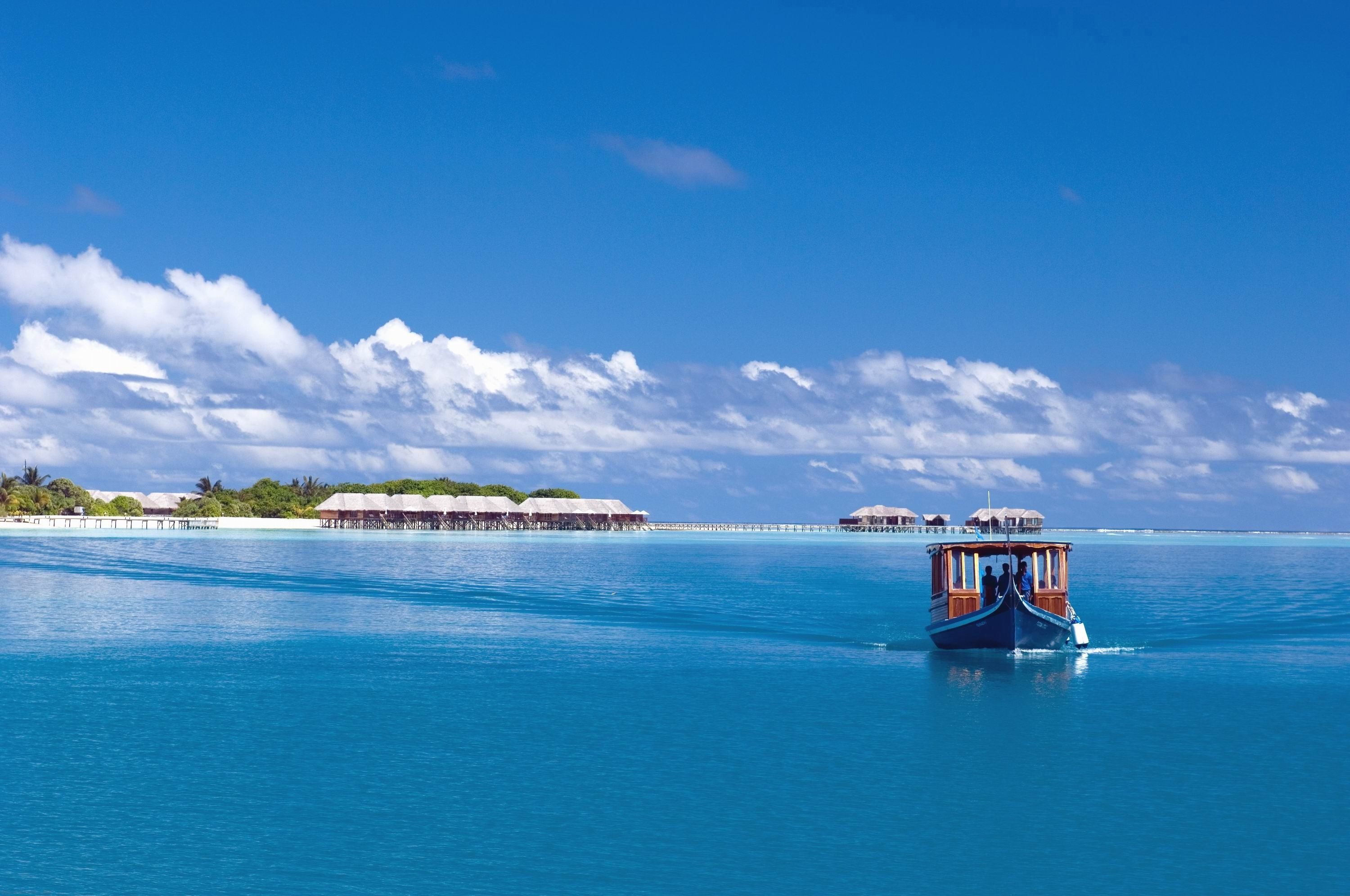 Download mobile wallpaper Nature, Tropics, Sea, Boat, Island, Maldives for free.