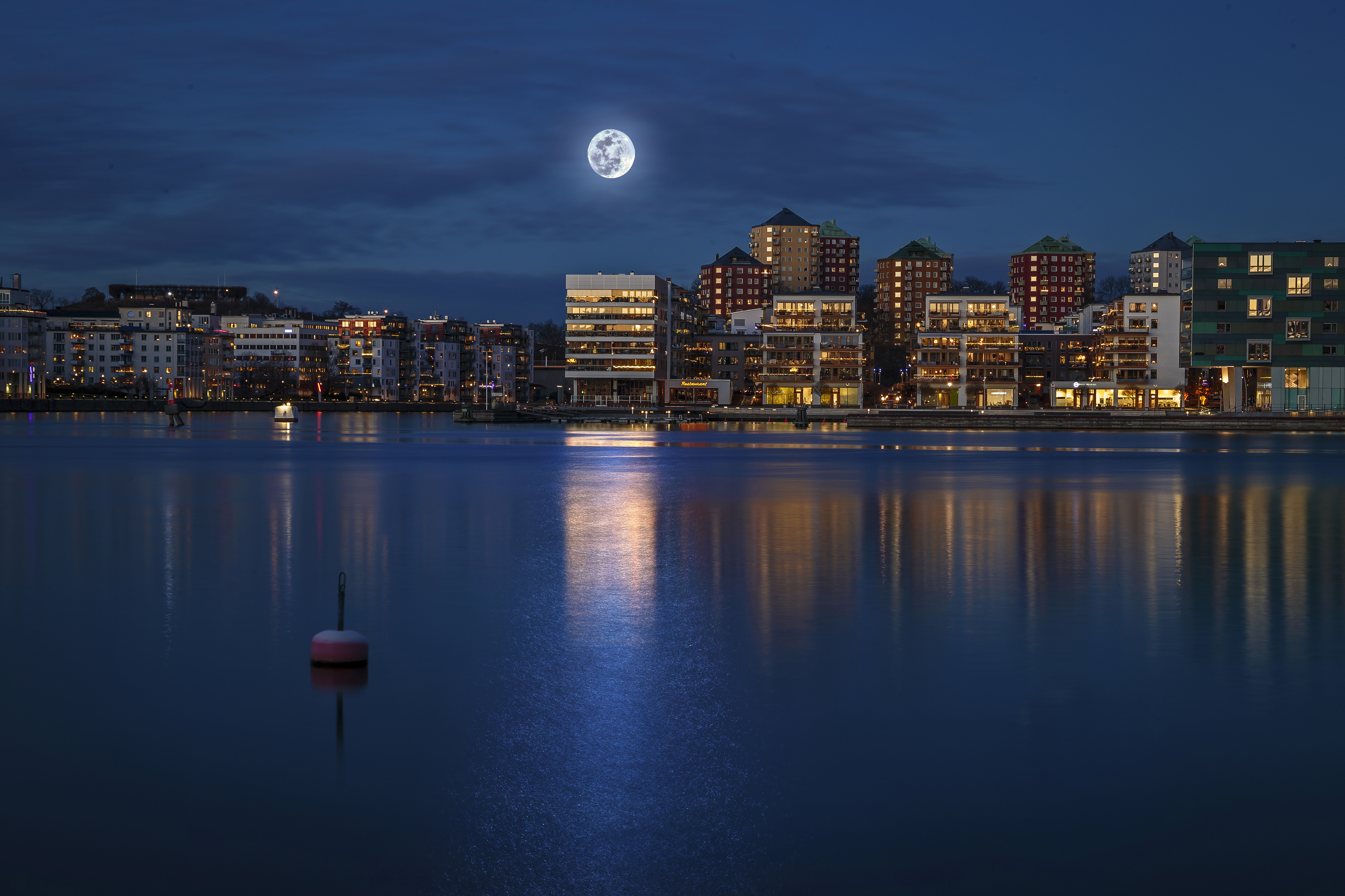 Download mobile wallpaper Cities, Night, Moon, City, Building, Stockholm, Sweden, Man Made for free.
