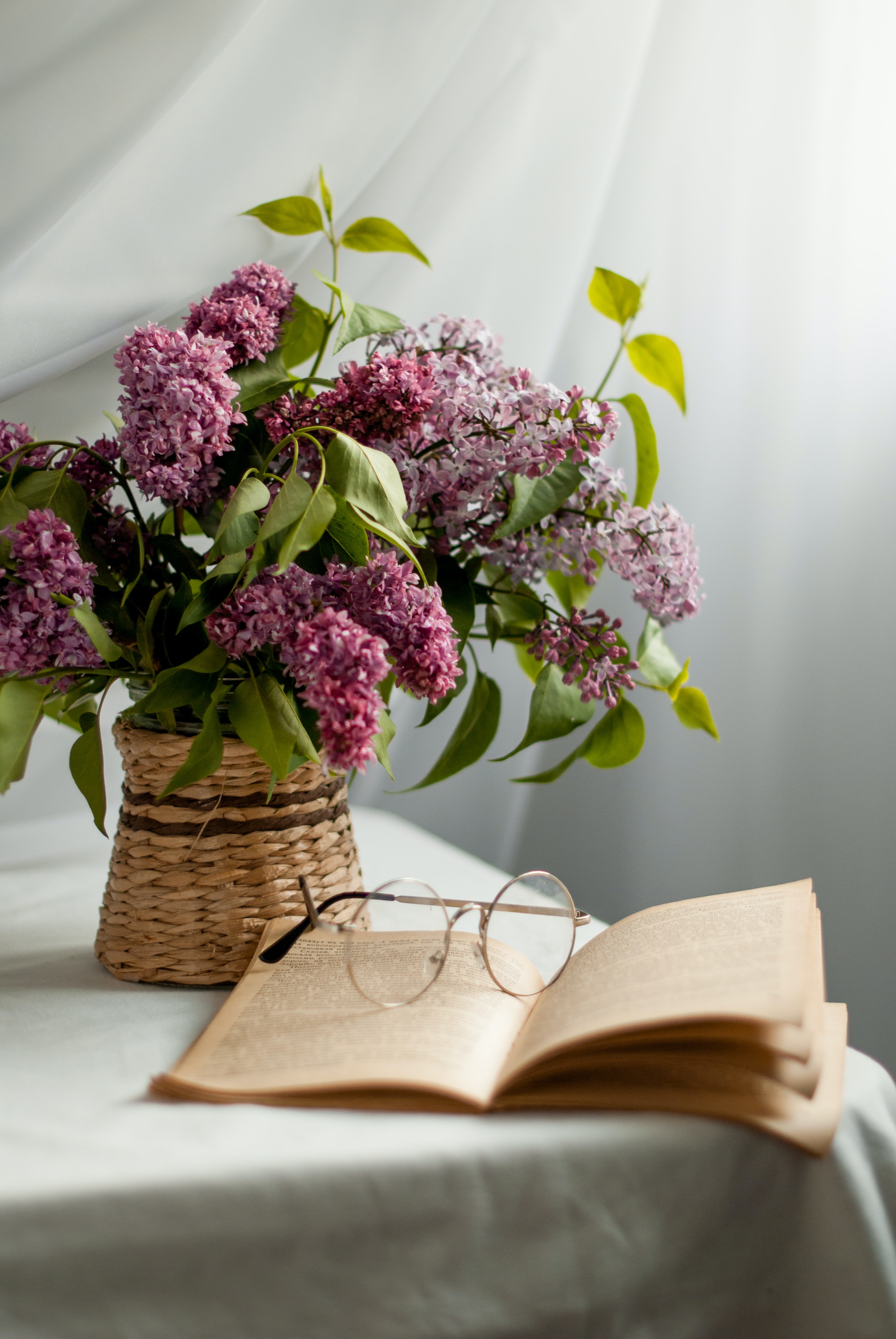 Download mobile wallpaper Lilac, Glasses, Flowers, Spectacles, Book for free.