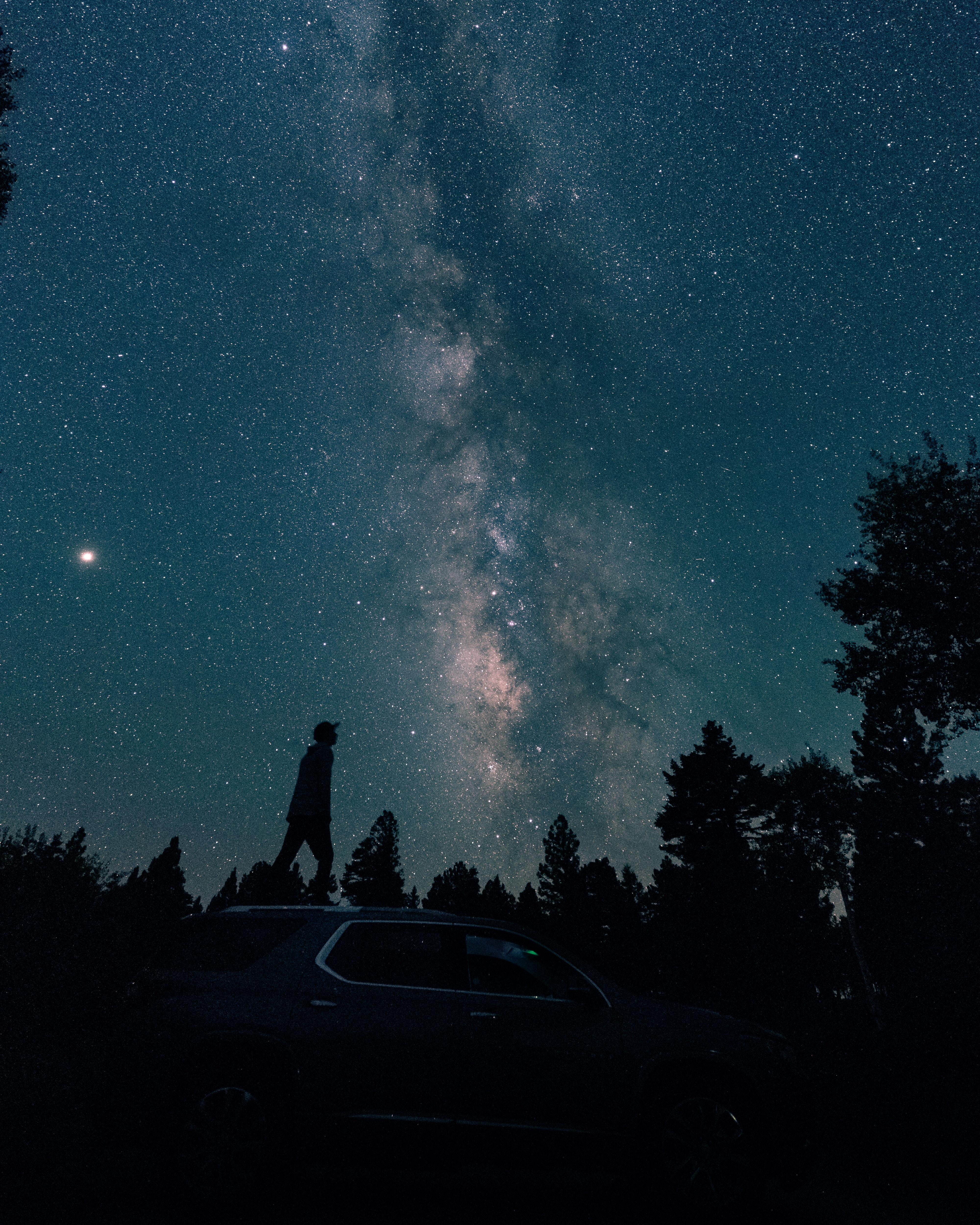 Download mobile wallpaper Milky Way, Trees, Silhouette, Car, Starry Sky, Night, Dark for free.