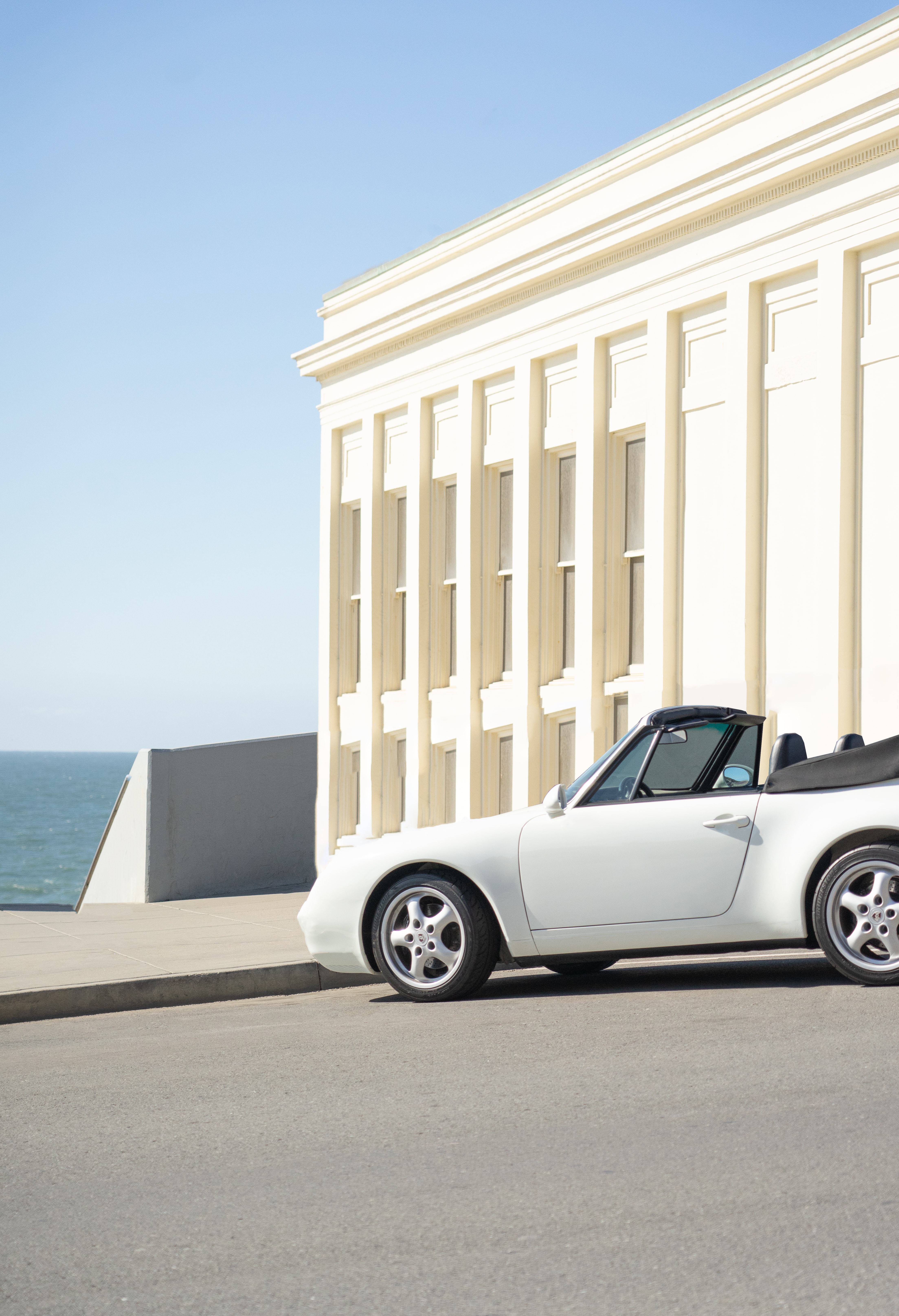 Download mobile wallpaper Cabriolet, Side View, Building, Car, Cars for free.