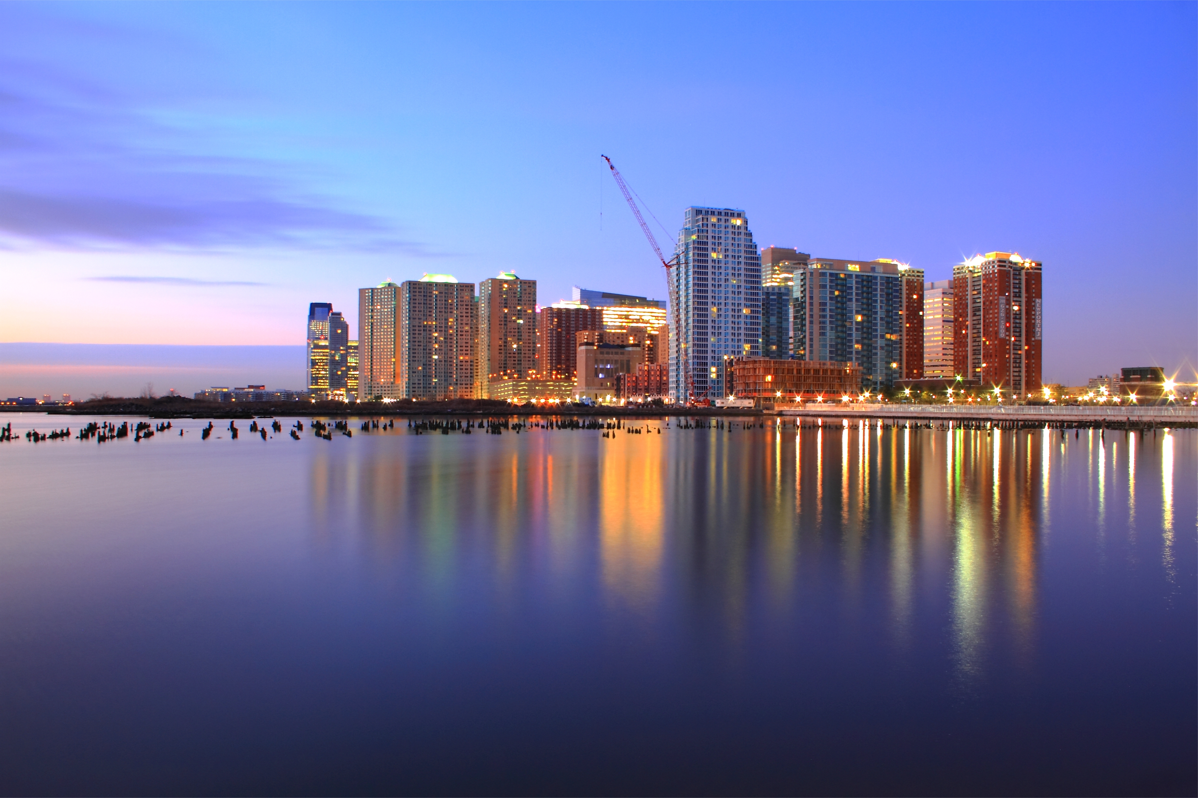 Free download wallpaper Sky, Clouds, Lights, Reflection, Shine, Evening, United States, Port, Jersey City, State Of New Jersey, New Jersey State, Hudson, Cities, Rivers, Pink, Usa, Lilac, Light, Skyscrapers, Hdr, Sunset on your PC desktop