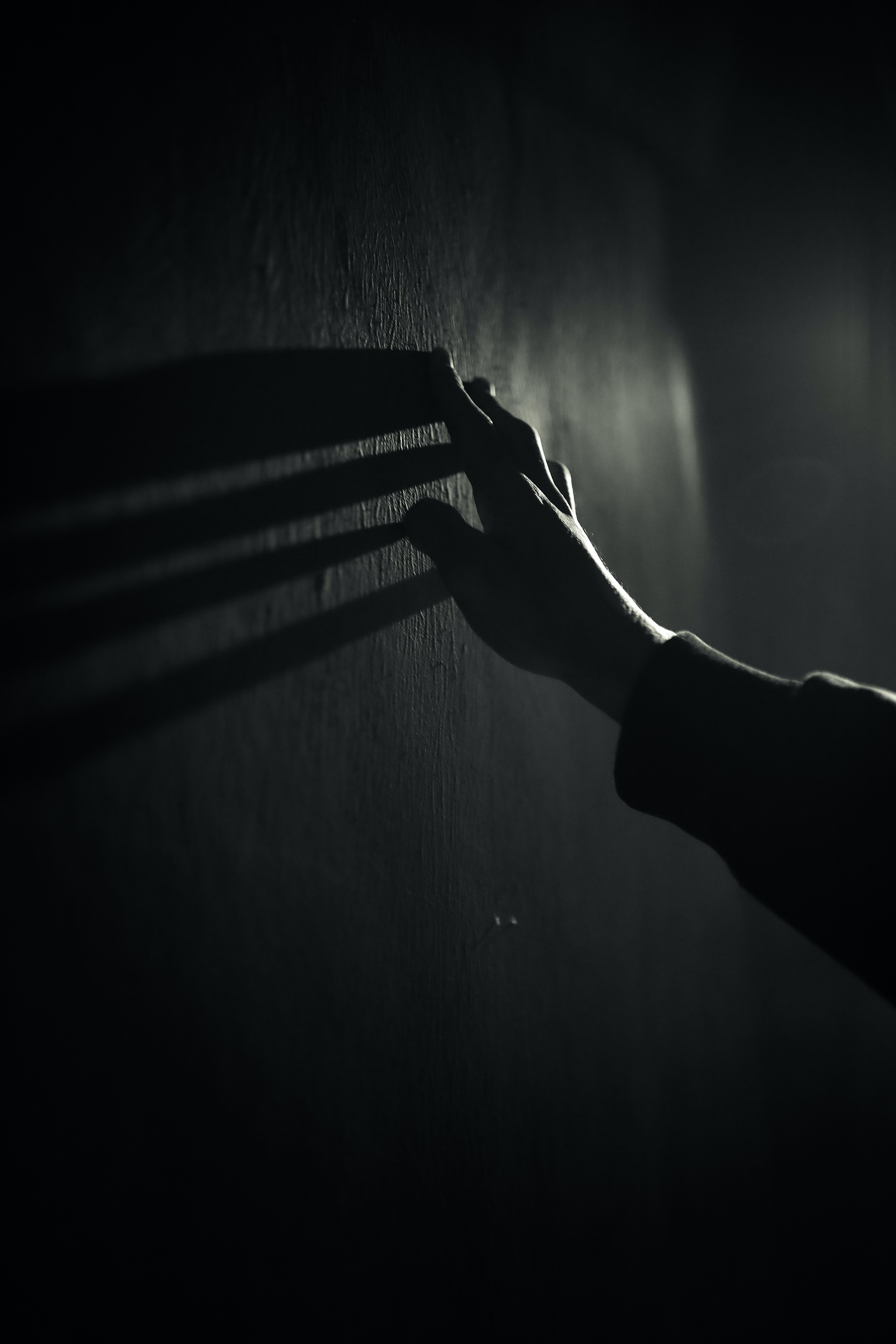 Download mobile wallpaper Shadow, Wall, Touch, Chb, Bw, Touching, Hand, Dark for free.