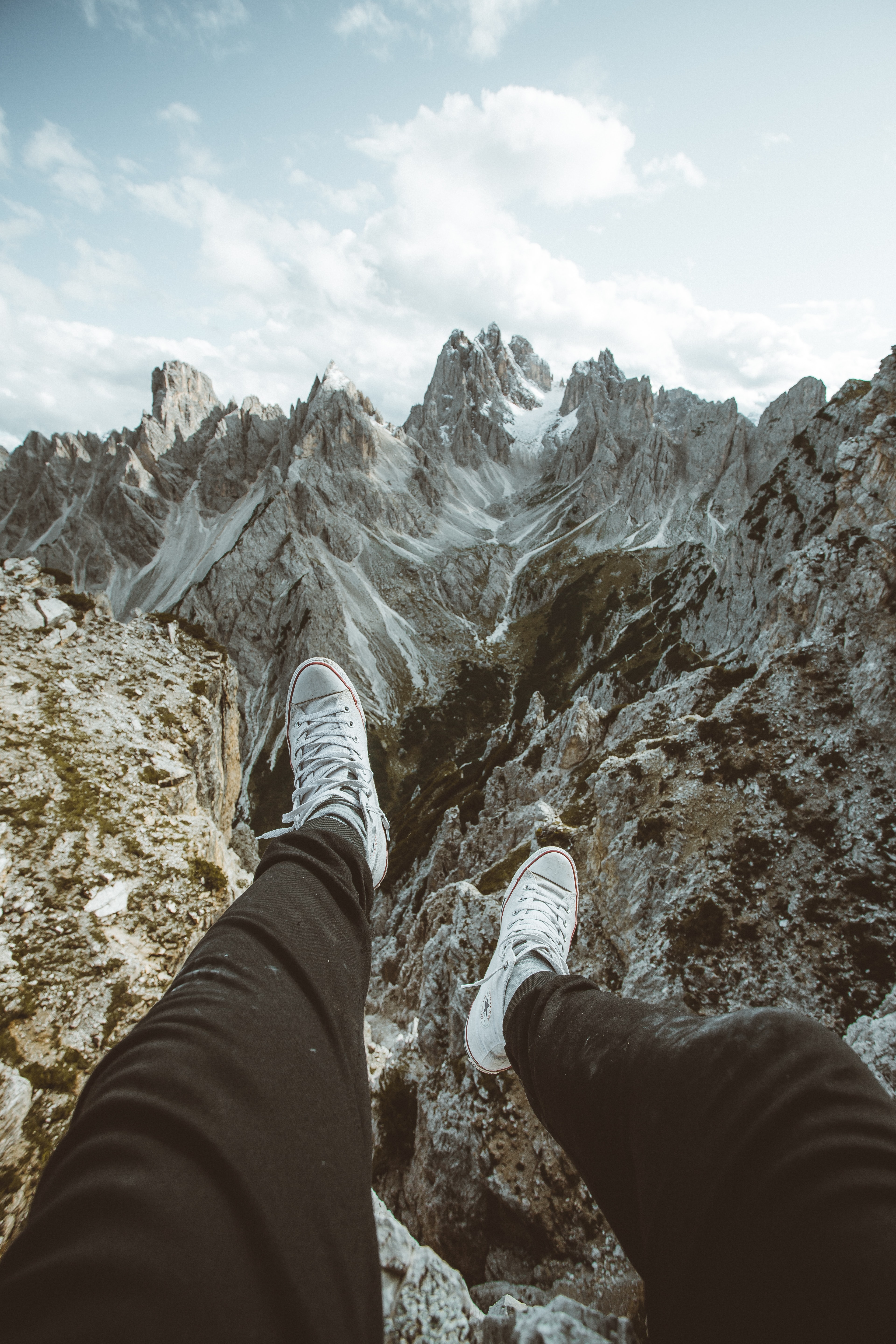 Download mobile wallpaper Miscellaneous, Legs, Miscellanea, Sneakers, Mountains, Shoes for free.
