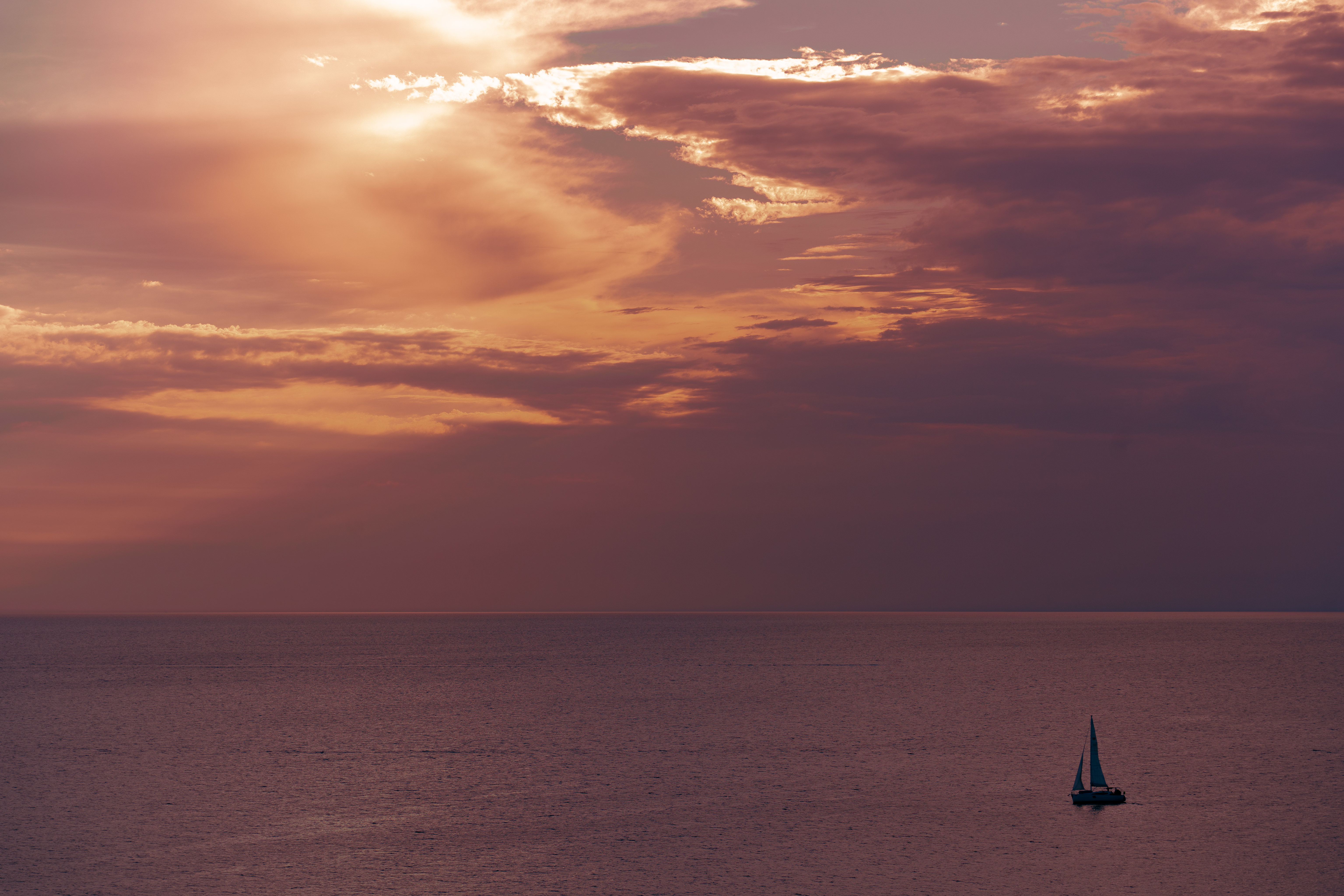 Download mobile wallpaper Sea, Sailfish, Horizon, Nature, Sunset, Sailboat for free.