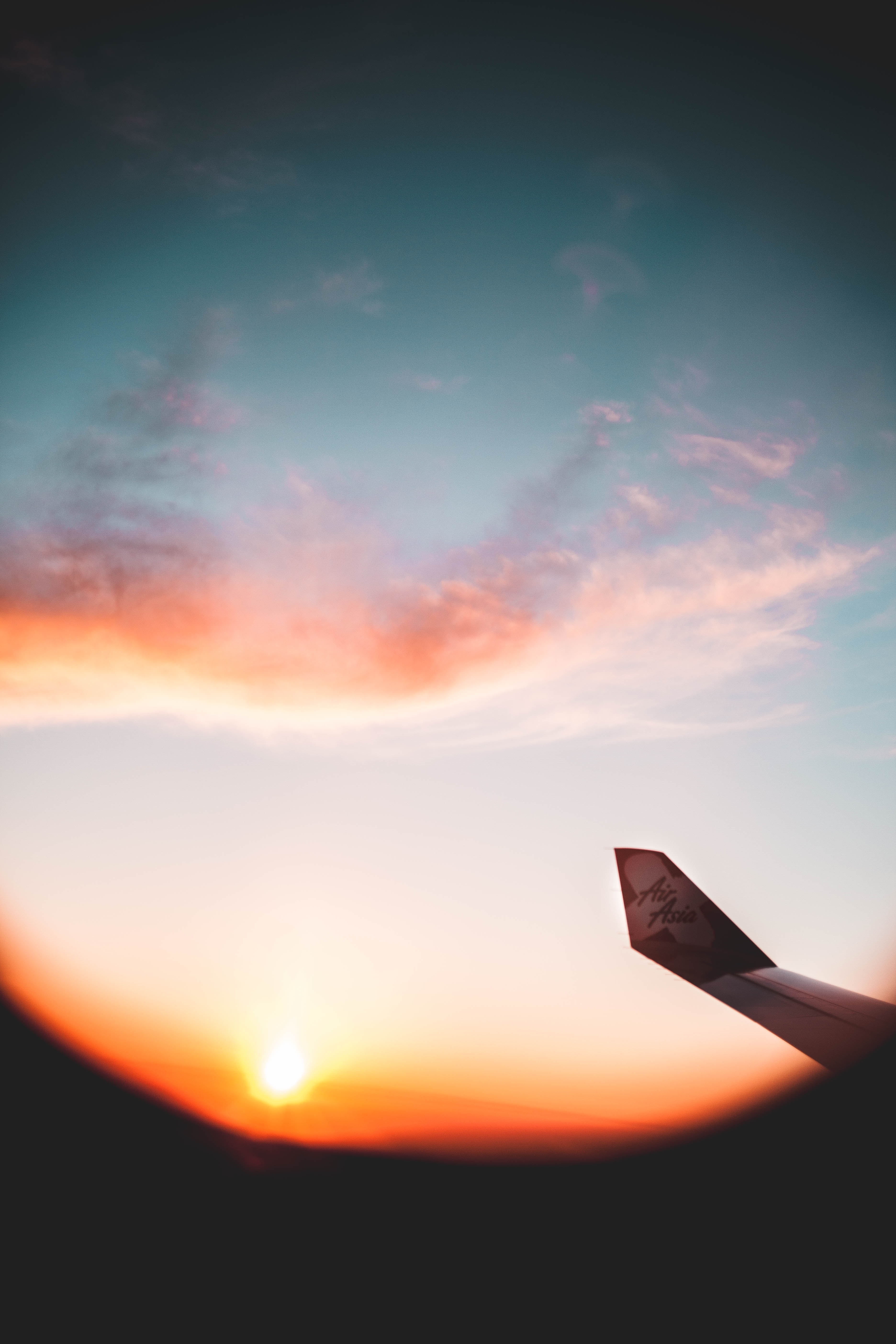 vertical wallpaper wing, plane, sunset, miscellanea, miscellaneous, porthole, airplane, view