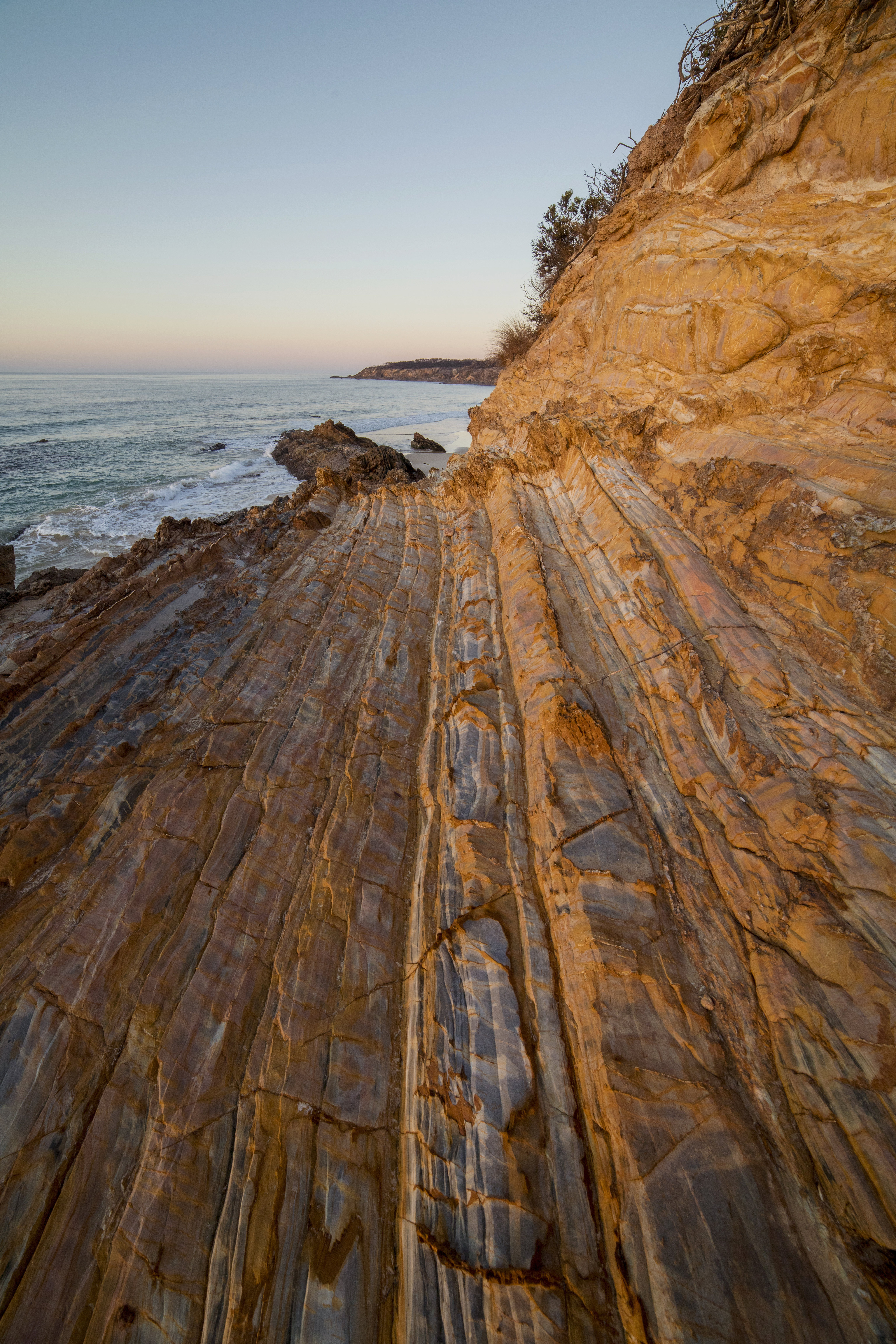 Download mobile wallpaper Stones, Sky, Rocks, Sea, Coast, Nature, Horizon for free.