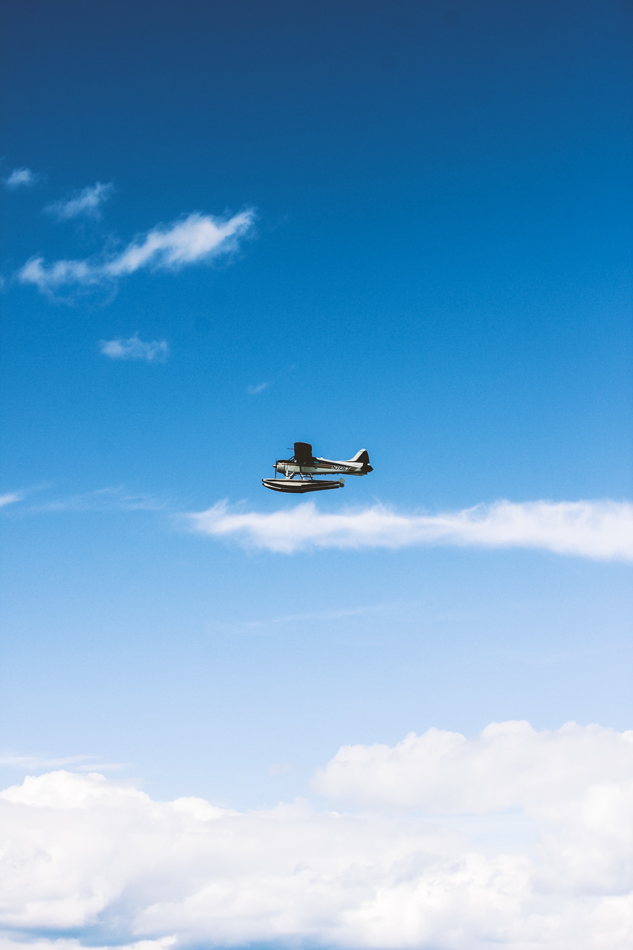 Download mobile wallpaper Height, Sky, Miscellanea, Clouds, Miscellaneous, Flight, Plane, Airplane for free.