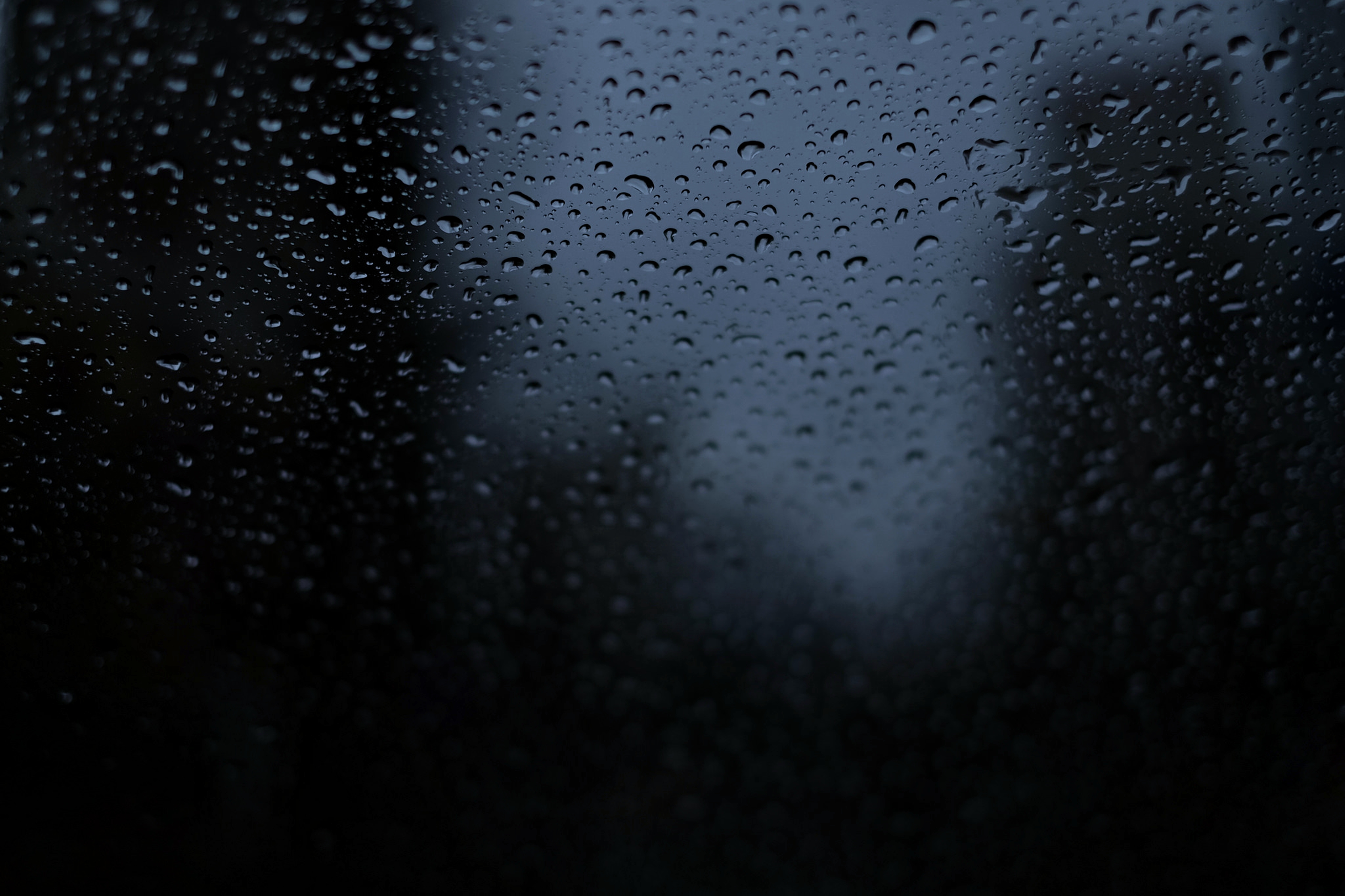Download A peaceful view  rain falling softly outside a window Wallpaper   Wallpaperscom