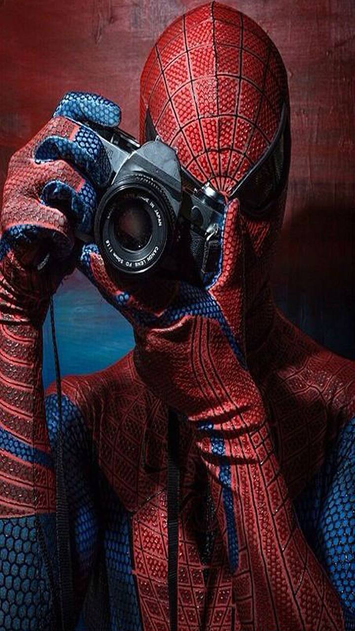 Человек паук с фотоаппаратом