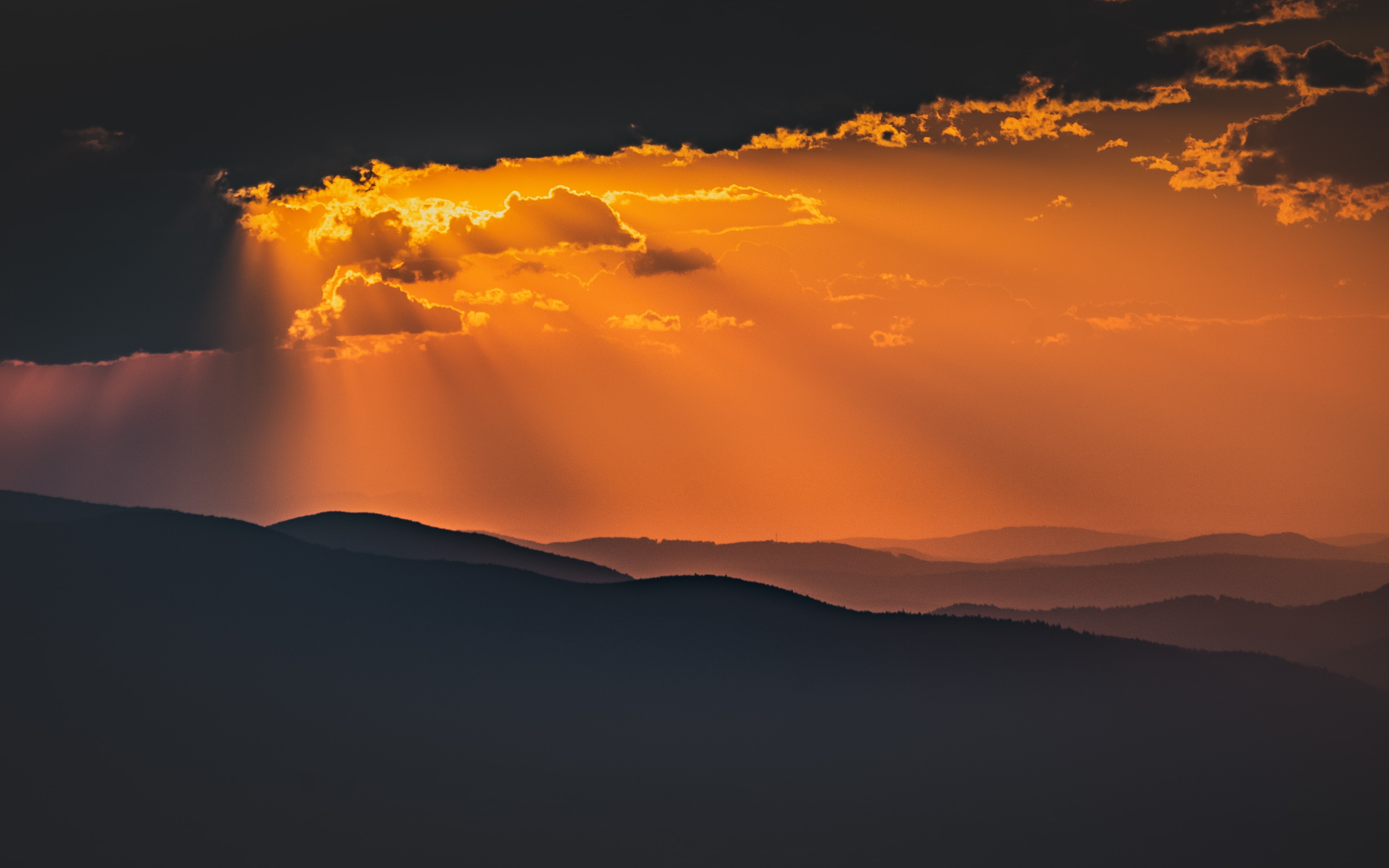 Download mobile wallpaper Beams, Mountains, Clouds, Dusk, Rays, Twilight, Sunset, Dark for free.
