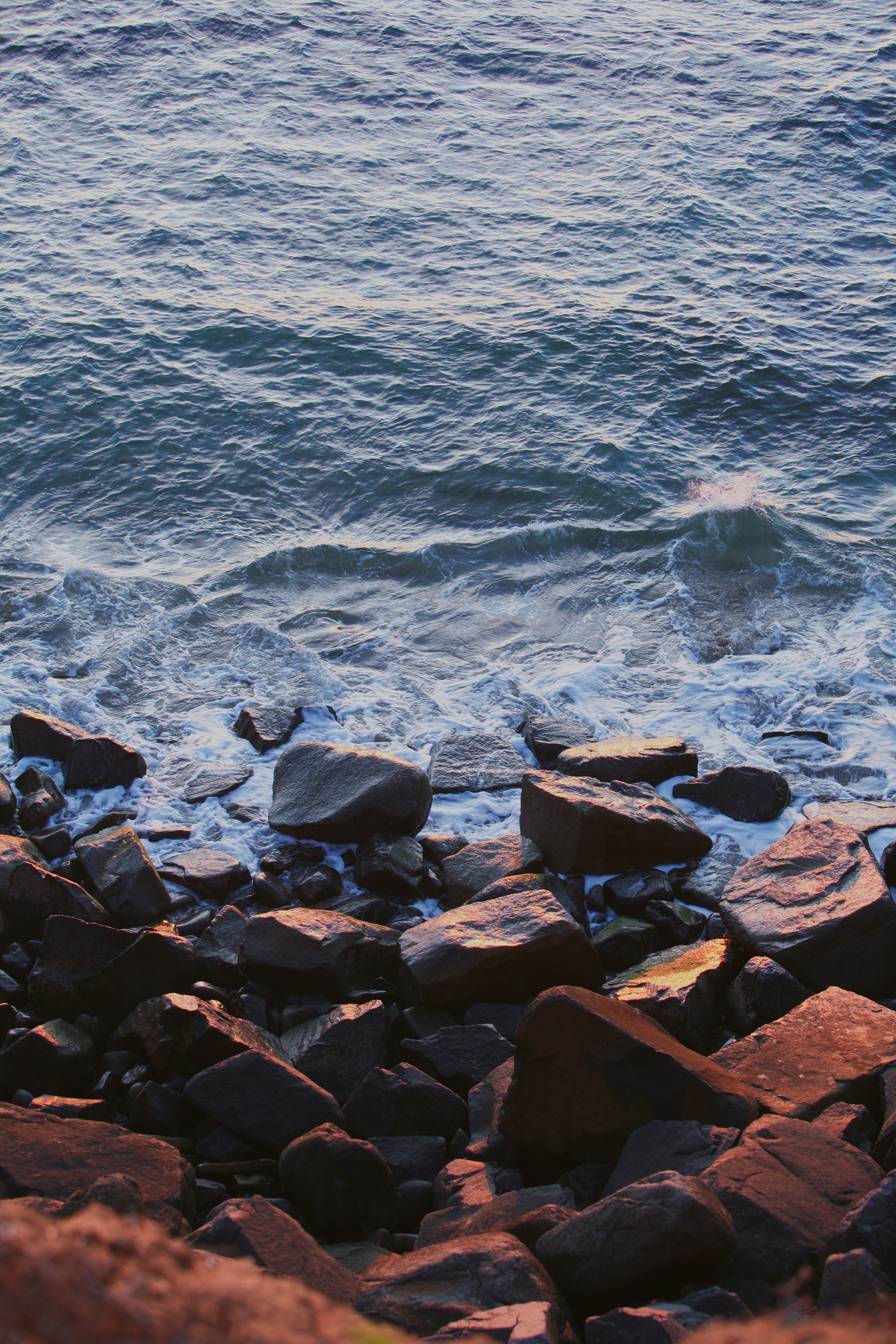 Download mobile wallpaper Shore, Bank, Stones, Waves, Sea, Water, Nature for free.